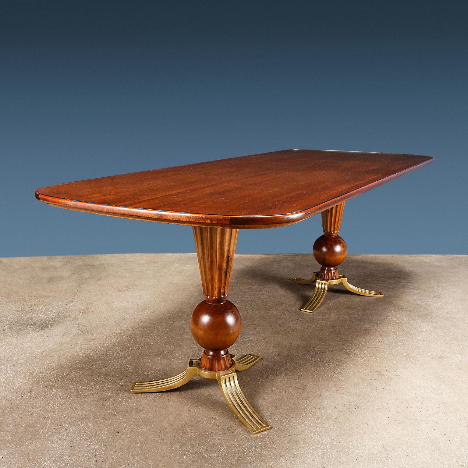 Elegant table in walnut wood, with glass top and brass legs, designed by Osvaldo Borsani for Arredamenti Borsani Varedo.