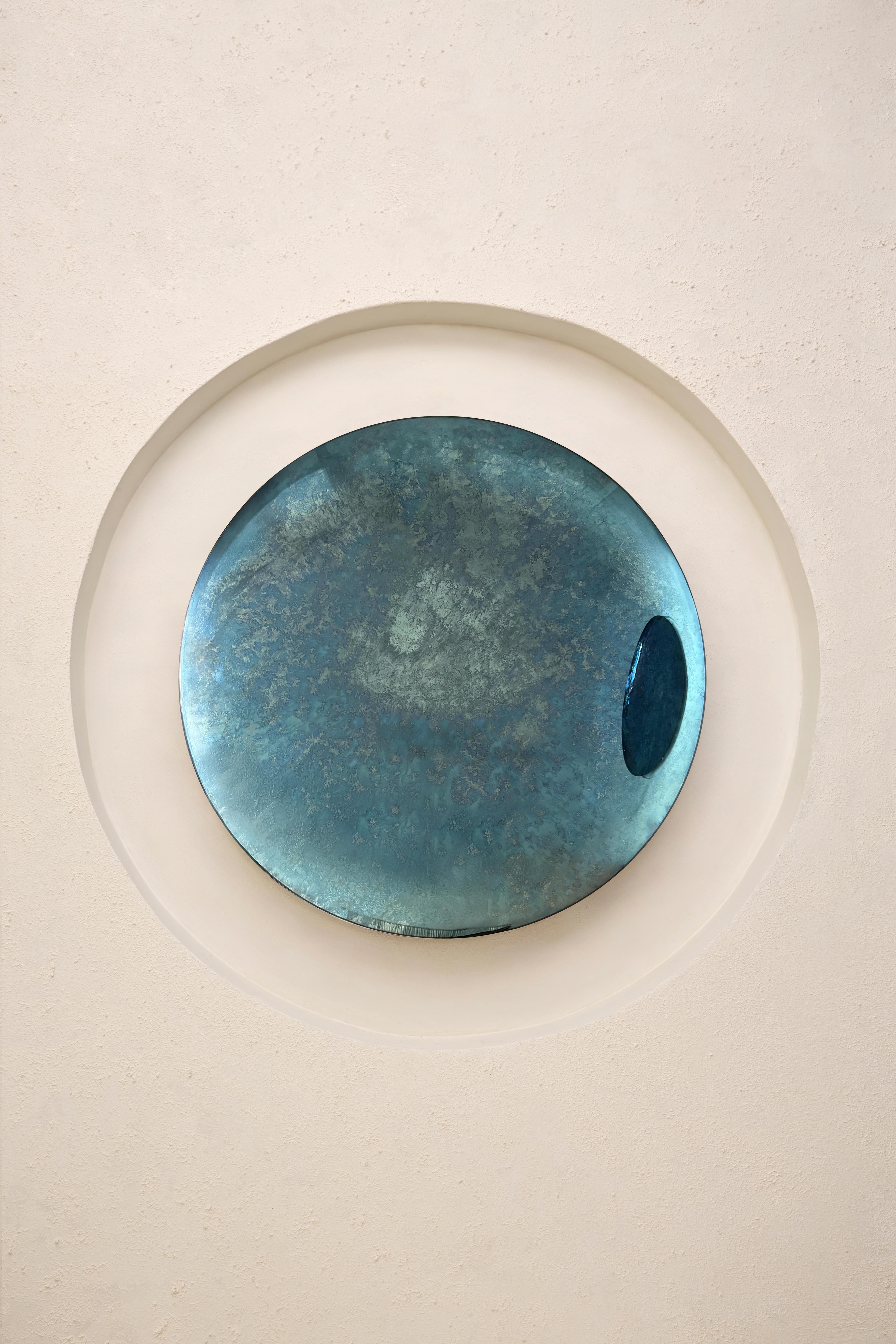 Convex Oxidized Mirror
Ø97 cm  Depth: 8 cm  Thickness: 4 mm 
Colour: Multicolor  Hanger: Brass

The ABYSS Collection

The ABYSS Collection of curved mirrors merges our own interpretation of mirroring techniques with a contemporary approach. Through