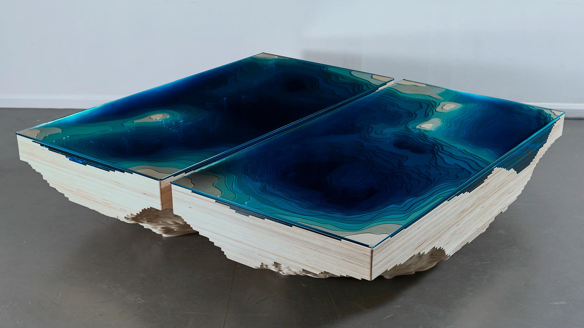 Abyss Kraken is a dramatic new statement coffee table by Christopher Duffy, played out over two pieces. 

Abyss Kraken continues Duffy’s explorations of the concept of depth with a mesmerising depiction of the Earth’s seabed, played out in a