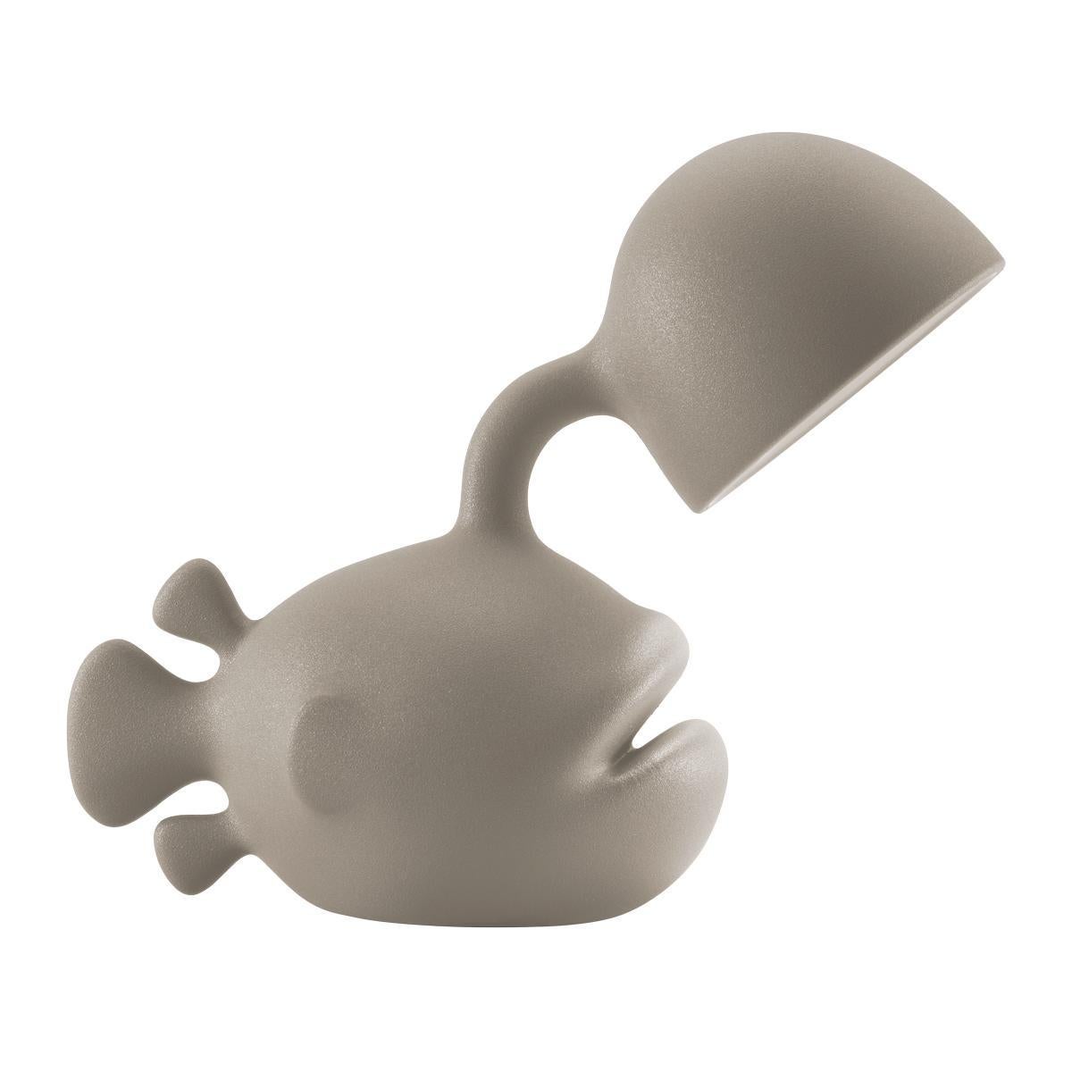 Designed by Dai Sugasawa, Abyss is a bold fish-shaped table lamp in recyclable polyethylene. Inspired by the anglerfish swimming in the deep seas with its luminous built-in rod, Abyss will dock directly to your house bringing light on your dining or