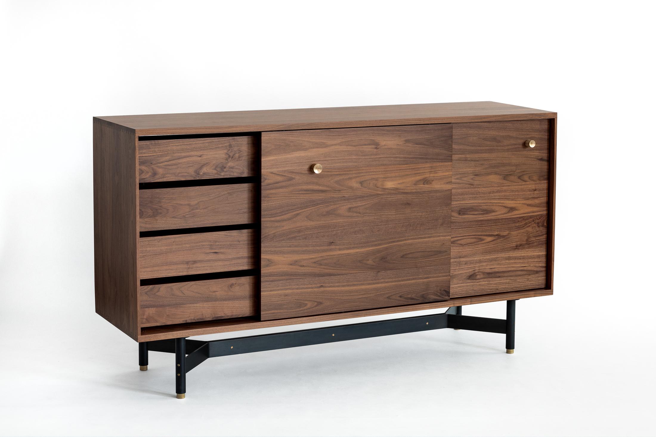Ac 10 is a handmade, solid walnut dresser console with interior drawers and shelving. It features a clean and minimal exterior, making for an elegant yet functional storage solution for a variety of applications in the home or office.

Shown in