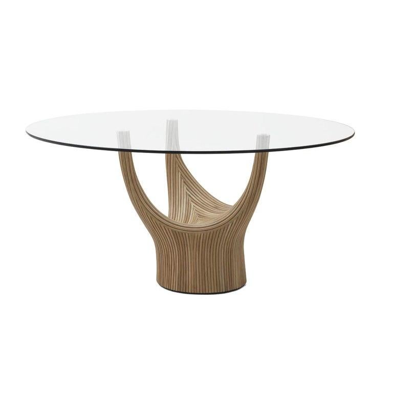 Acacia end table, Kenneth Cobonpue
Materials: Rattan and steel
Dimensions: D 58.5 x W 120 x H 74 cm

Kenneth Cobonpue is a multi-awarded furniture designer and manufacturer from Cebu, Philippines. His passage to design began in 1987, studying