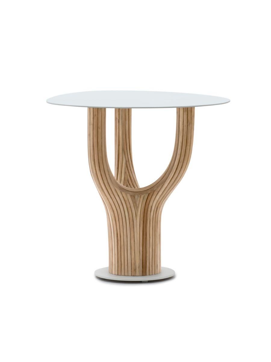 End table by Kenneth Cobonpue
Materials: Rattan, steel, glass. Whitewash top, natural base.
Dimensions: 67 x 51.5 x H 51 cm


Inspired by the ancient baobab, the table collection is made of rattan poles fastened together to create sculptural