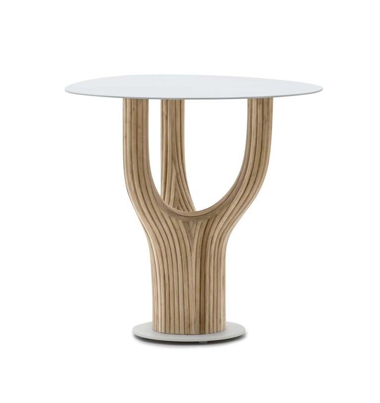 Acacia end table, Kenneth Cobonpue.
Materials: Rattan, Steel.
Dimensions: D 51.5 x W 67 x H 51 cm.

Kenneth Cobonpue is a multi-awarded furniture designer and manufacturer from Cebu, Philippines. His passage to design began in 1987, studying