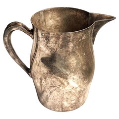 Jarra de agua bulbosa de plata sobre cobre de mediados de siglo de la Academia
