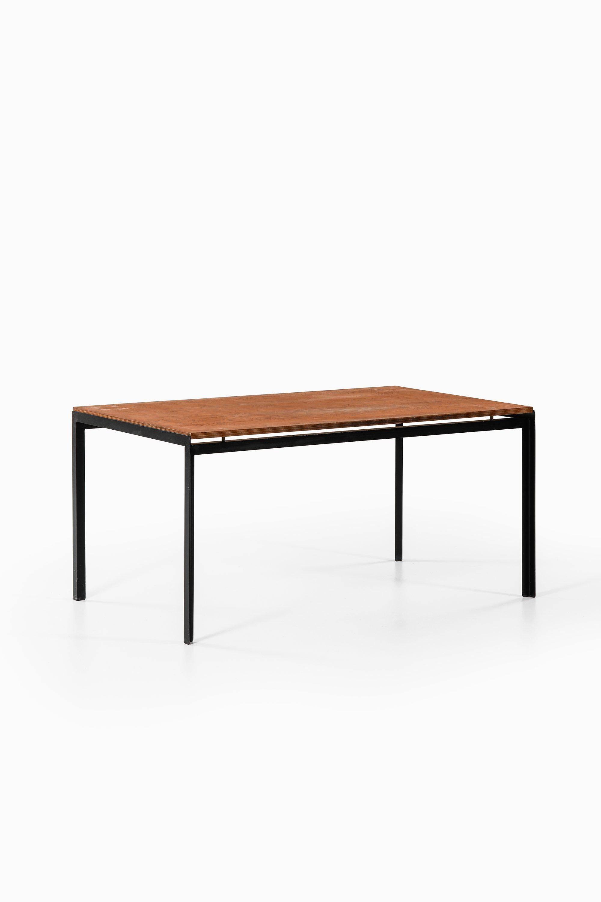 Academy Table in Black Lacquered Steel and Pine by Poul Kjærholm, 1950's

Additional Information:
Material: Black lacquered steel, pine
Style: Mid century, Scandinavia
Produced by Rud. Rasmussen Cabinetmakers in Denmark
Dimensions (W x D x H): 141 x
