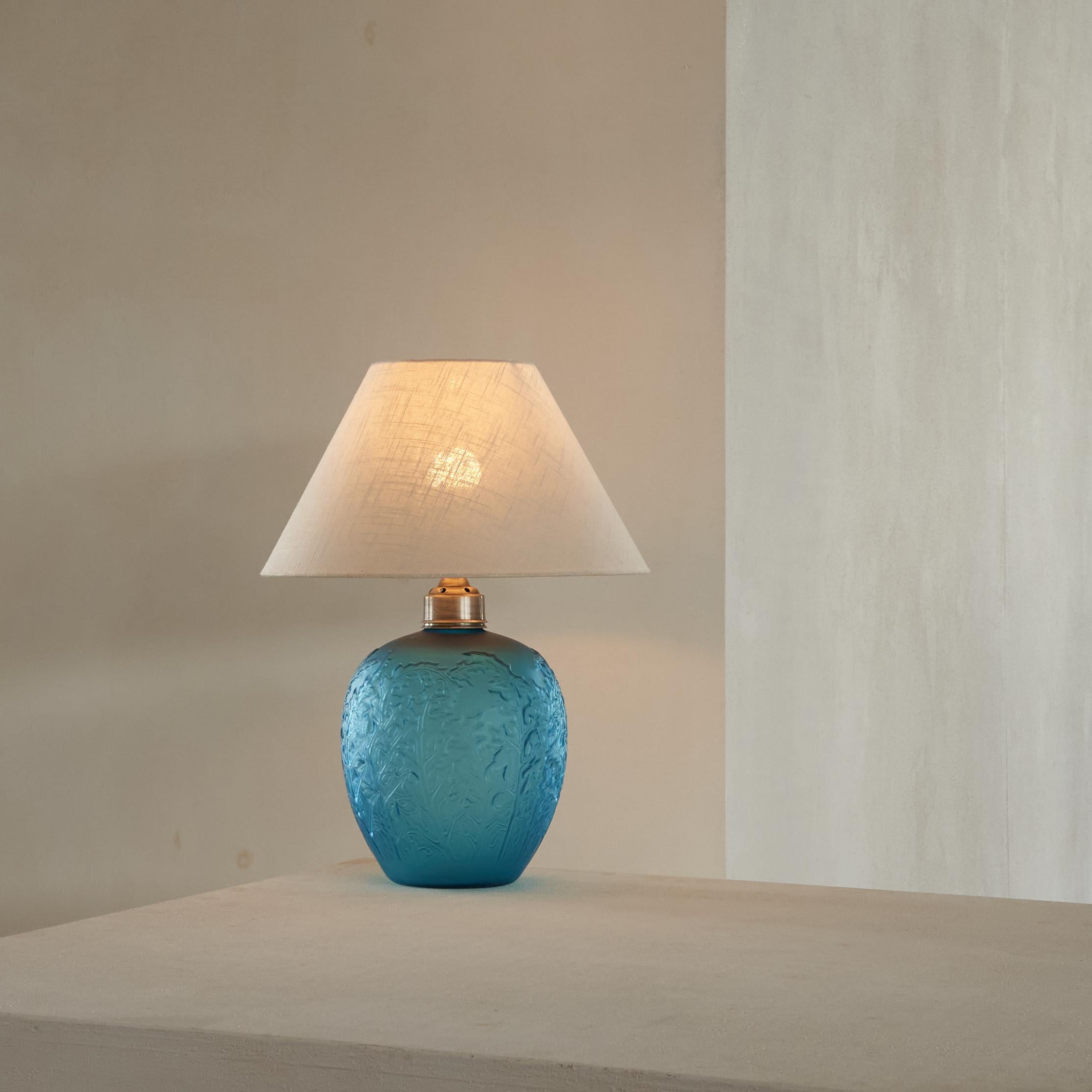Acanthes' Table Lamp after René Lalique by Consolidated Glass Company 1930s

Straight from the first owner in Ghent Belgium, comes this wonderful and rare table lamp in radiant blue art glass - made to a design after René Lalique. It comes from a
