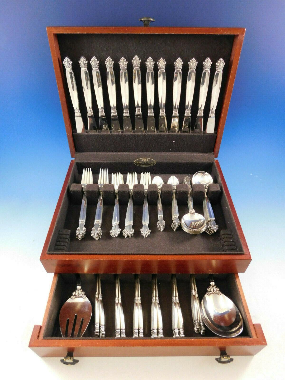 Exquisite Acanthus by Georg Jensen Sterling Silver Dinner Size Flatware set - 74 pieces. This set includes:

 12 Dinner Knives, long handle, 9