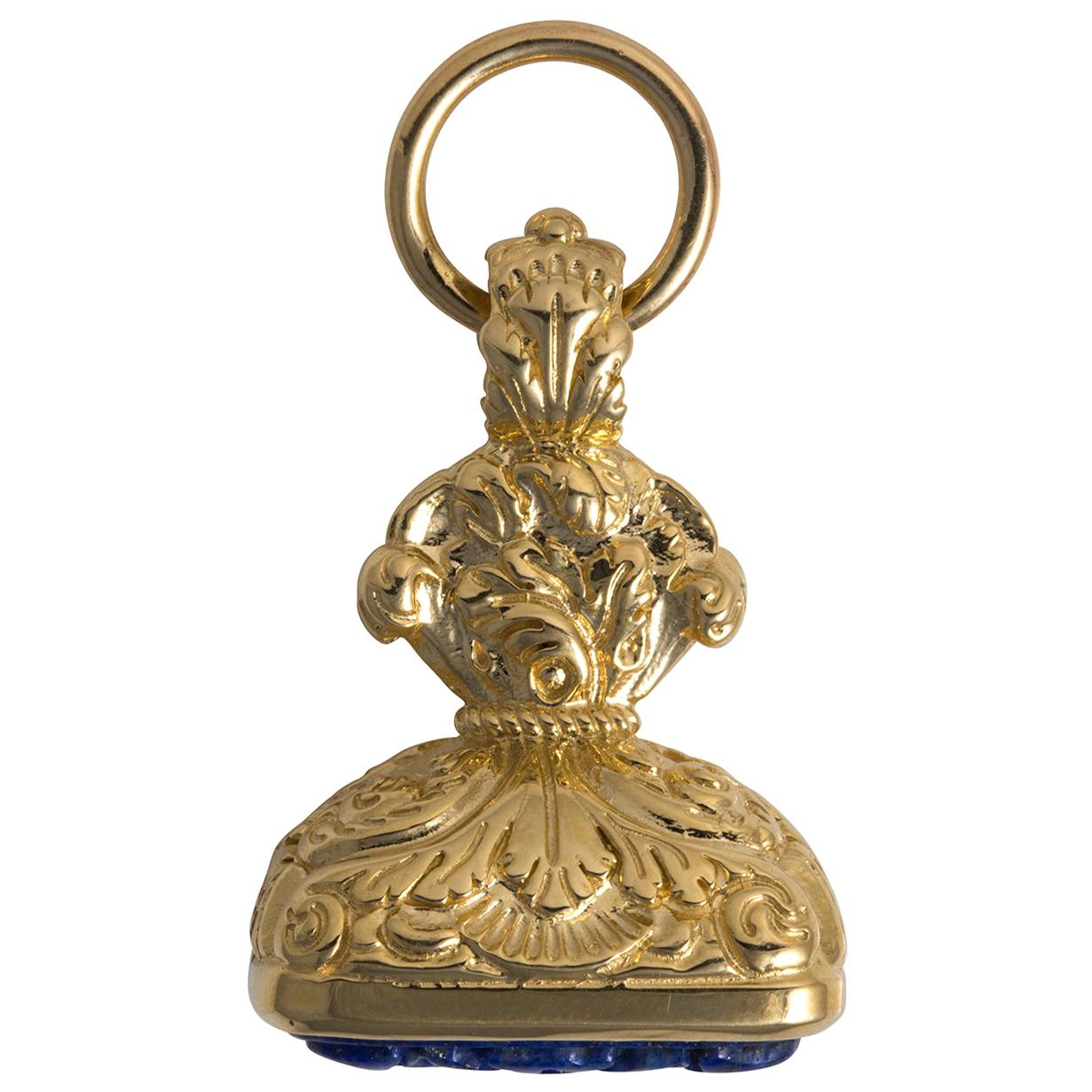 Acanthus Fob in 14 Karat Yellow Gold with Hand Carved Lapis Stone For Sale