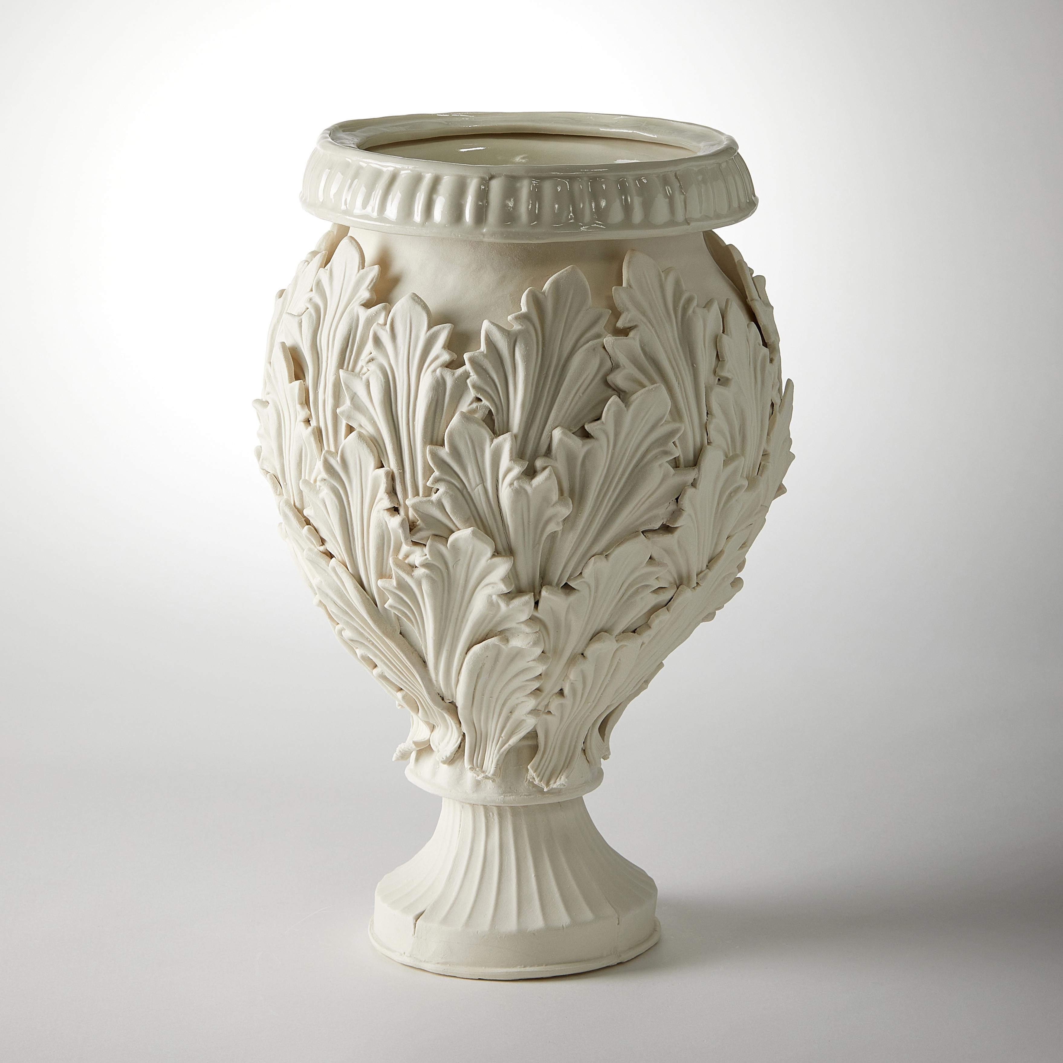 Acanthus I is a unique handmade porcelain vase with leaf decoration by the British artist Amy Hughes.

Originally from West Yorkshire, Amy Hughes lives and works in London. She shares a studio with 10 of her former students from the Royal College