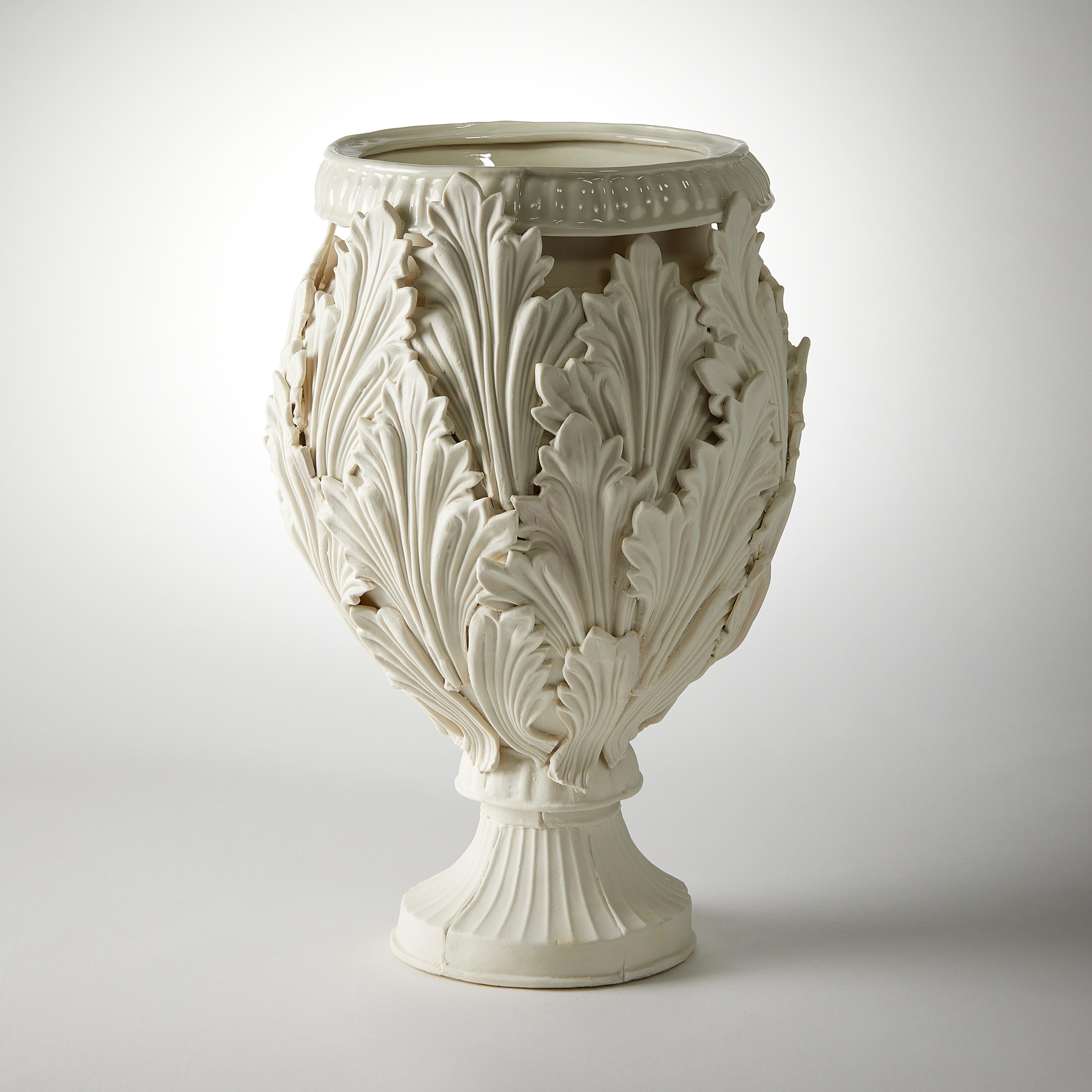 Acanthus II is a unique hand made porcelain vase with leaf decoration by the British artist Amy Hughes.

Originally from West Yorkshire, Amy Hughes lives and works in London. She shares a studio with 10 of her former students from the Royal