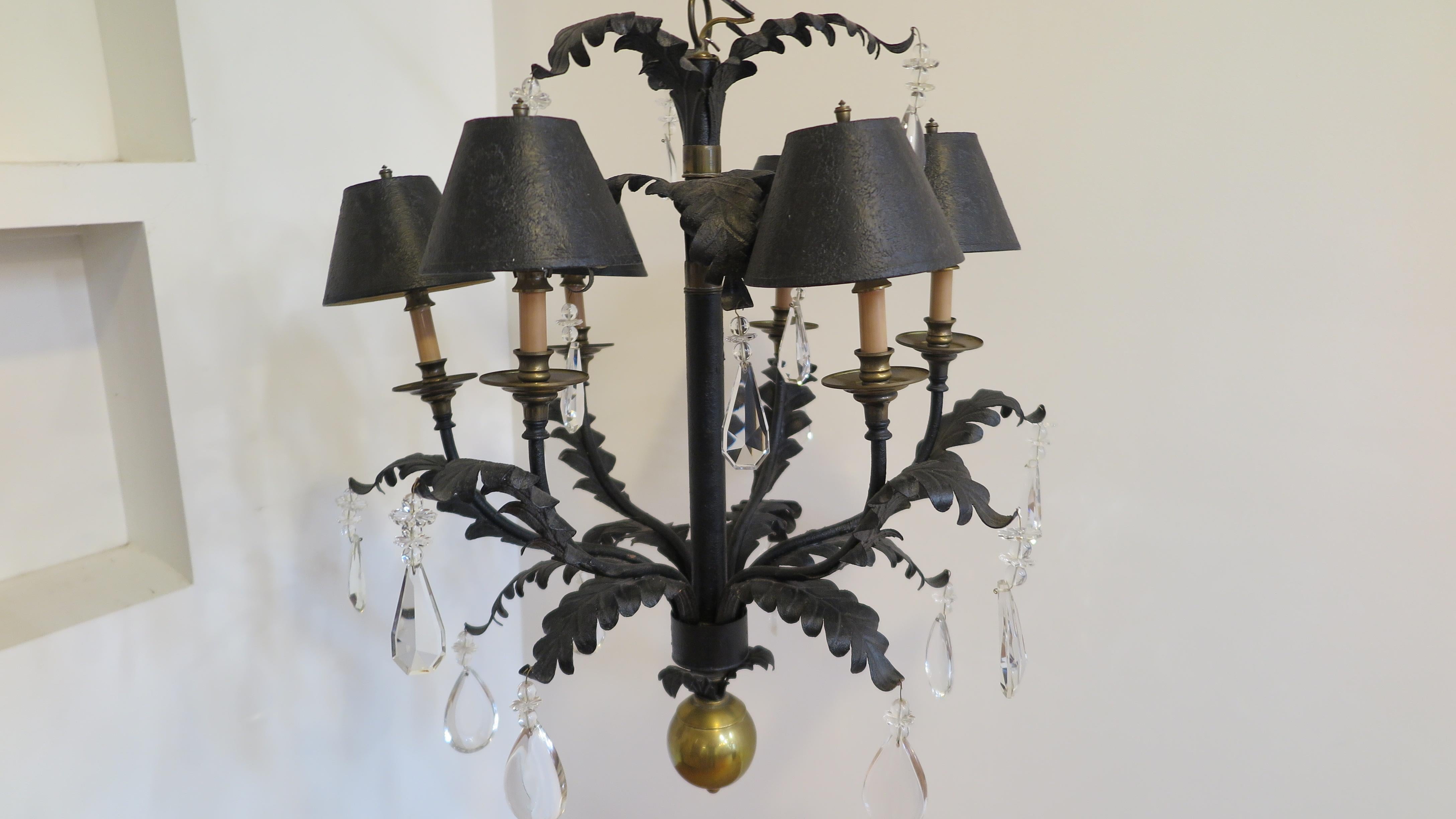 Acanthus Leaf Chandelier Hollywood Regency. Hollywood Regency Chandelier Acanthus leaf motif in black with brass and crystal prism, florets, and ball accent details. Hand formed Acanthus leaves in flowing bends draped in large crystal drops and
