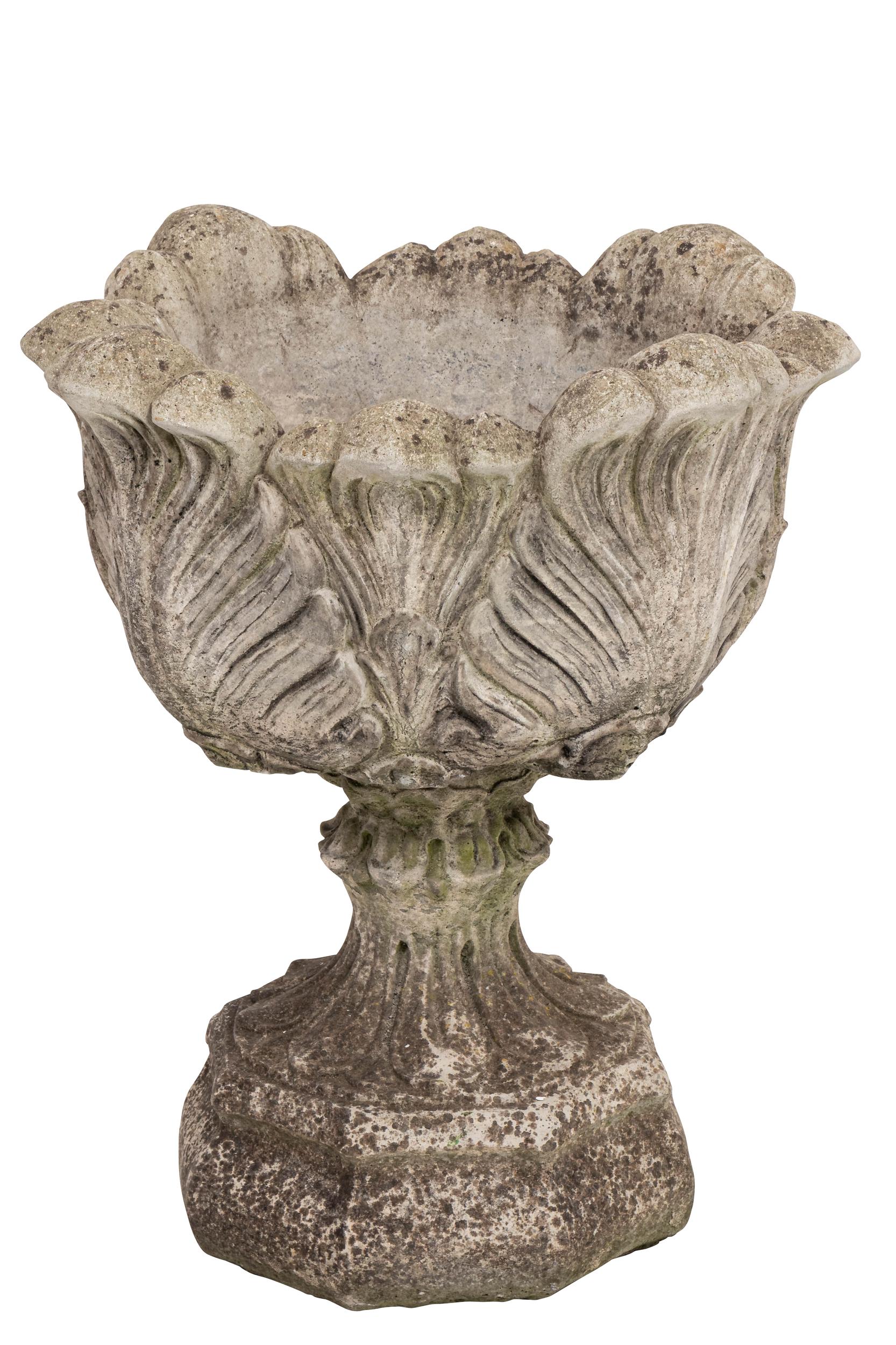 Beautifully designed cast stone acanthus leaf planters on stands. Some patina and in good condition.