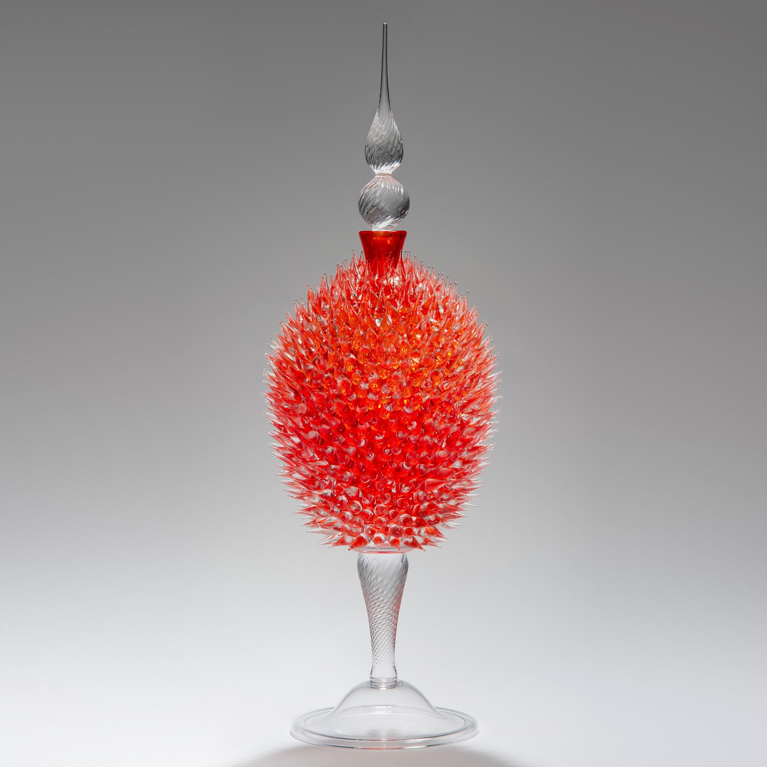 'Acanthus Veronese in Orange' is a unique sculptural glass jar by British glass artist James Lethbridge. Blown glass with the outer layer covered in flame worked decoration and adornment. With removable decorative glass stopper.

Initially