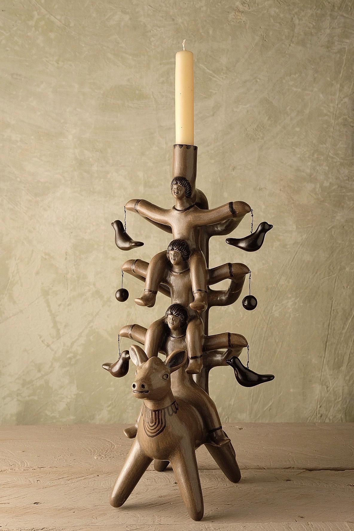 Acatlán candleholder by Onora
Dimensions: W 20 x D 15 x H 40 cm
Materials: Clay

Available in black, white and taupe Hand sculpted clay, covered with a mineral based slip and burnished using a quartz stone. The “Circo Collection” is a