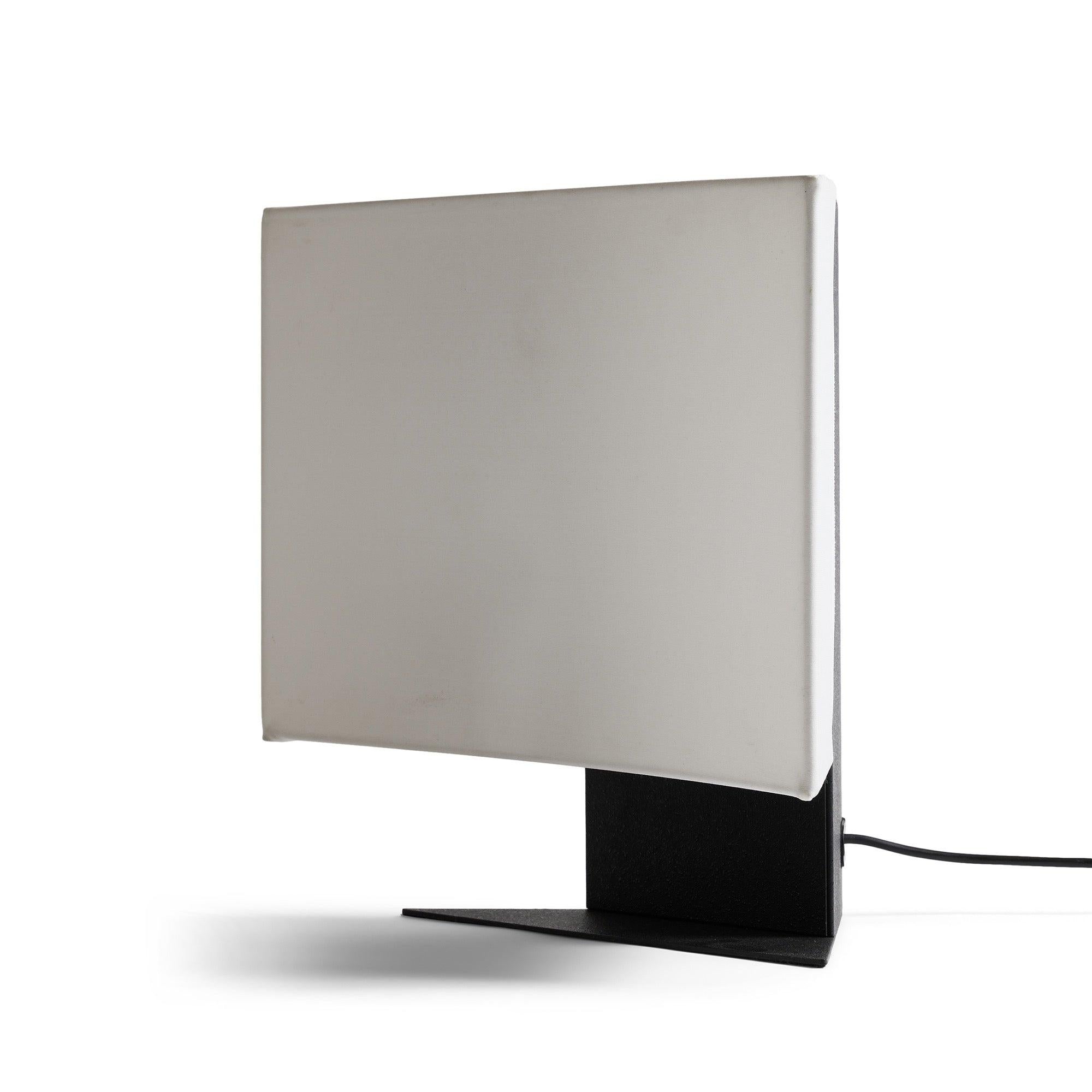 An enameled steel 'Accademia' table lamp with a fabric stretched planar diffuser.?(Sold Individually)
