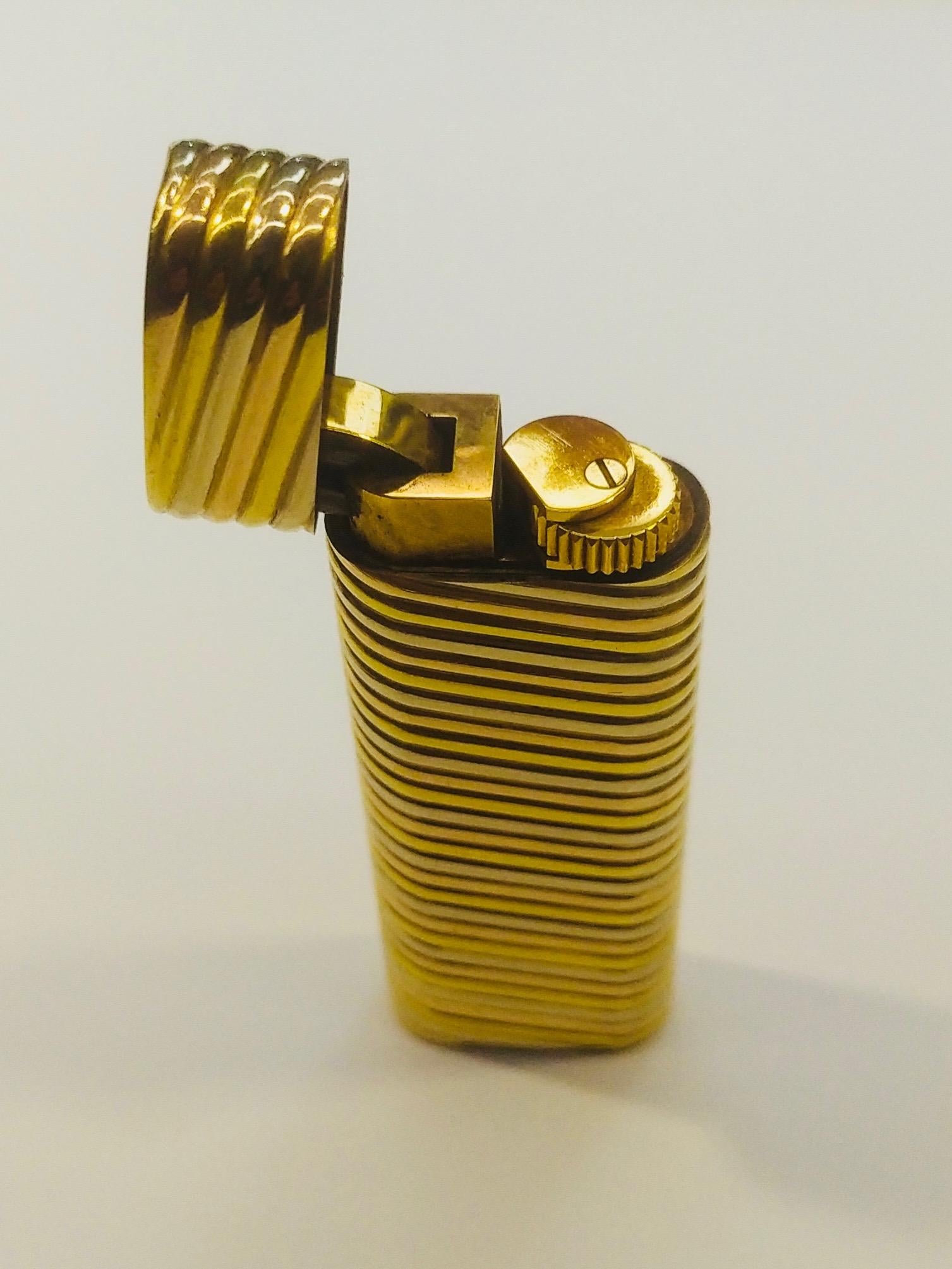 Women's or Men's Cartier Paris lighter in 18k gold in three colors