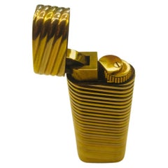 Accendino Cartier Paris in oro 18k a tre colori