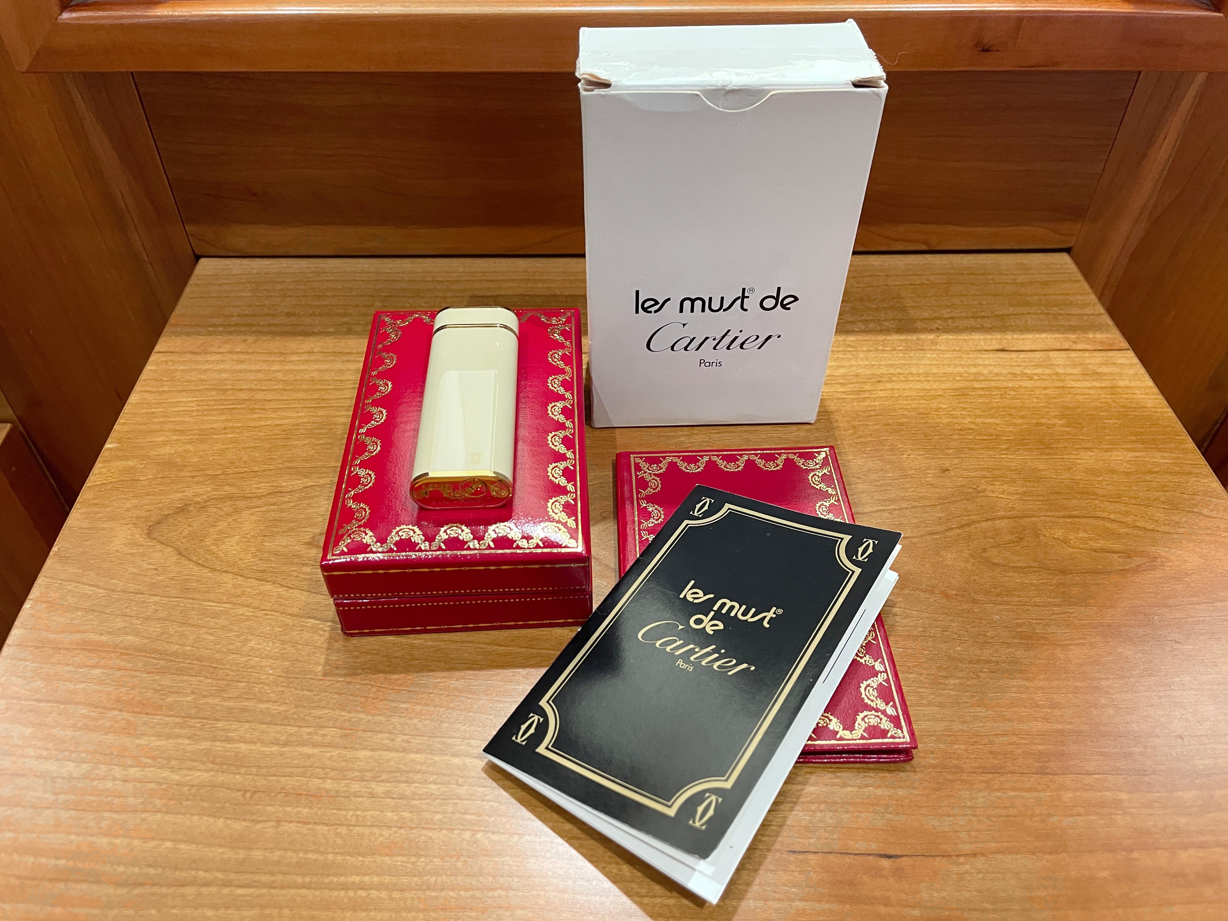 Les Must de Cartier oval gold-plated and ivory lacquer lighter 7