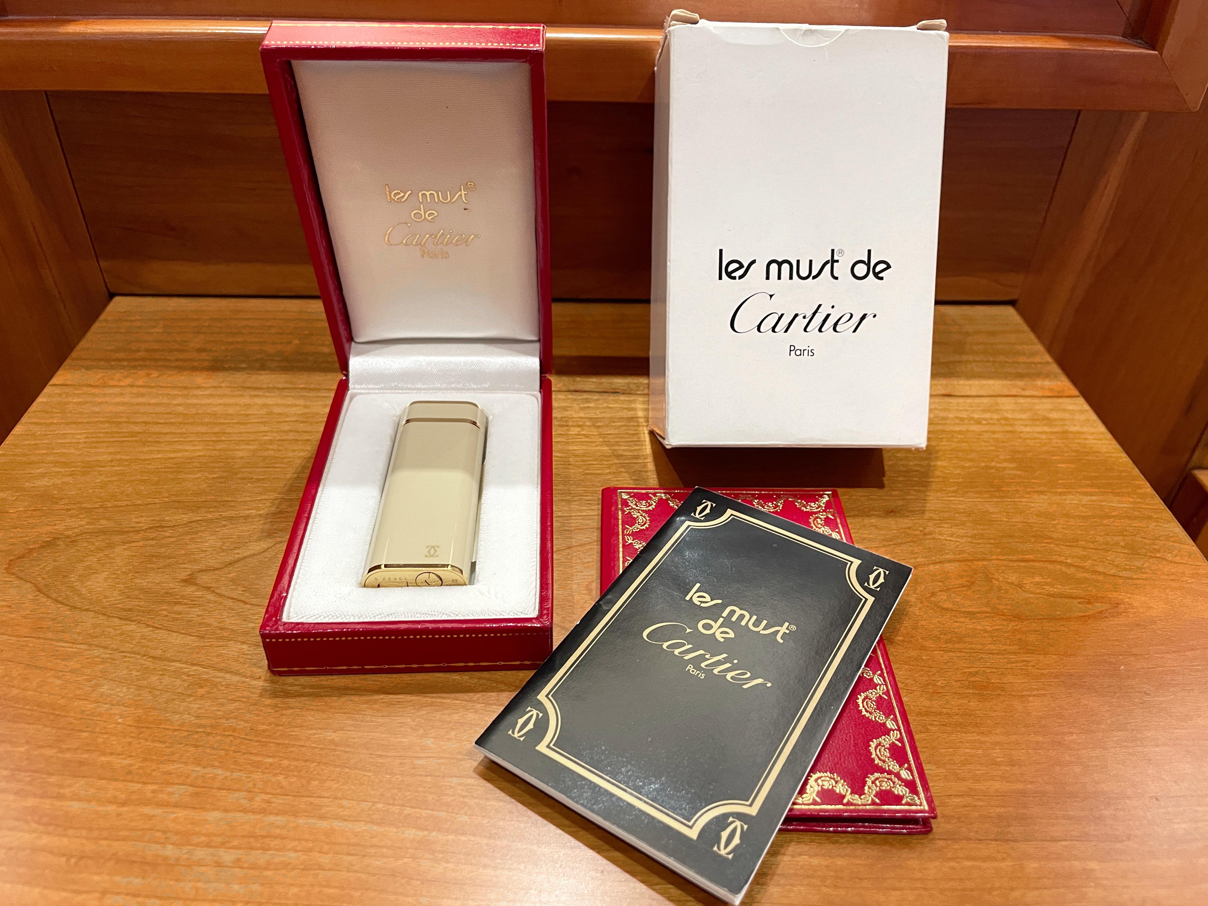Les Must de Cartier oval gold-plated and ivory lacquer lighter 8