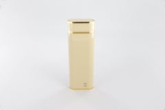 Accendino Les Must de Cartier ovale placcato oro e lacca avorio