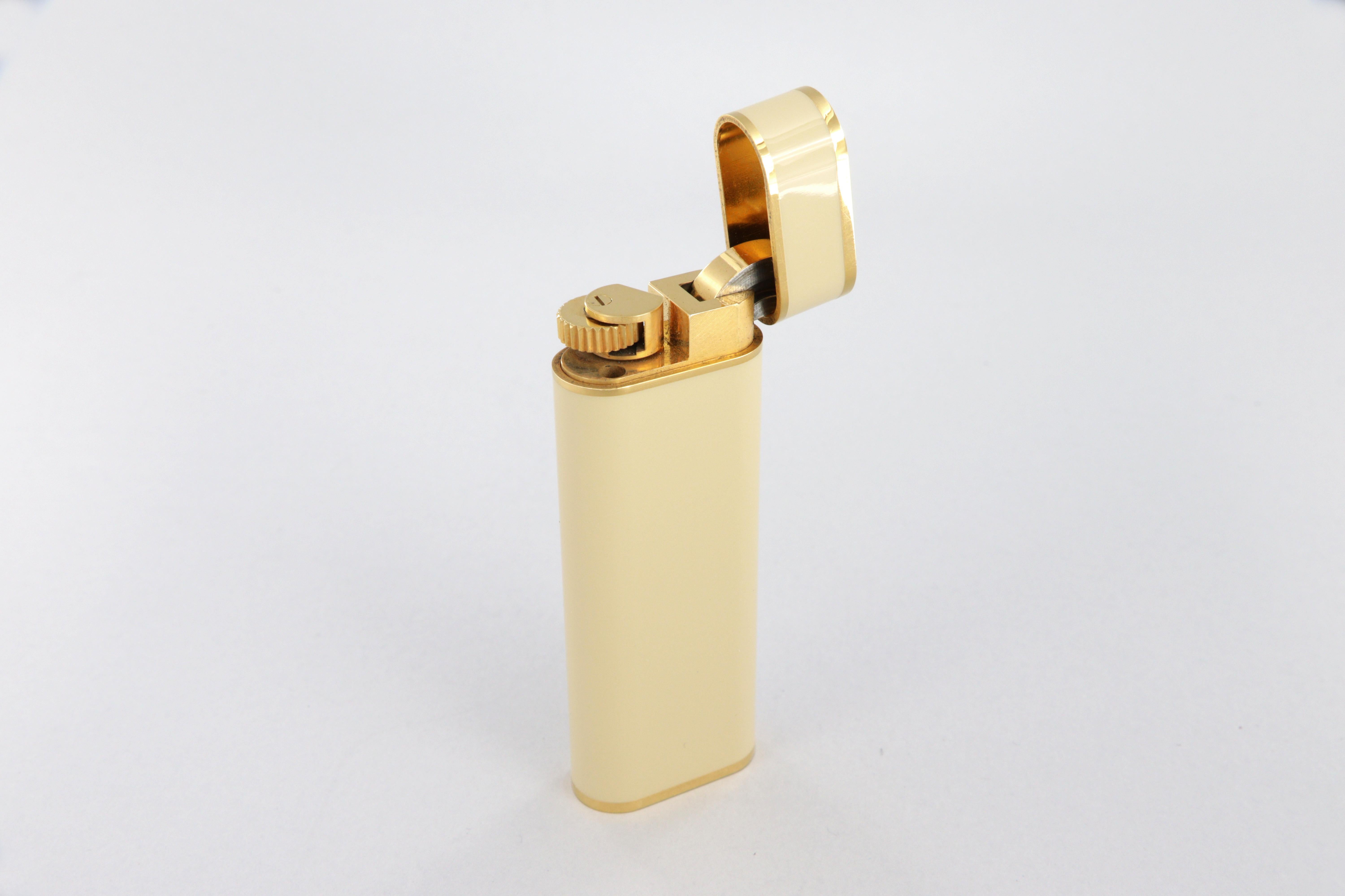 Women's or Men's Les Must de Cartier oval gold-plated and ivory lacquer lighter