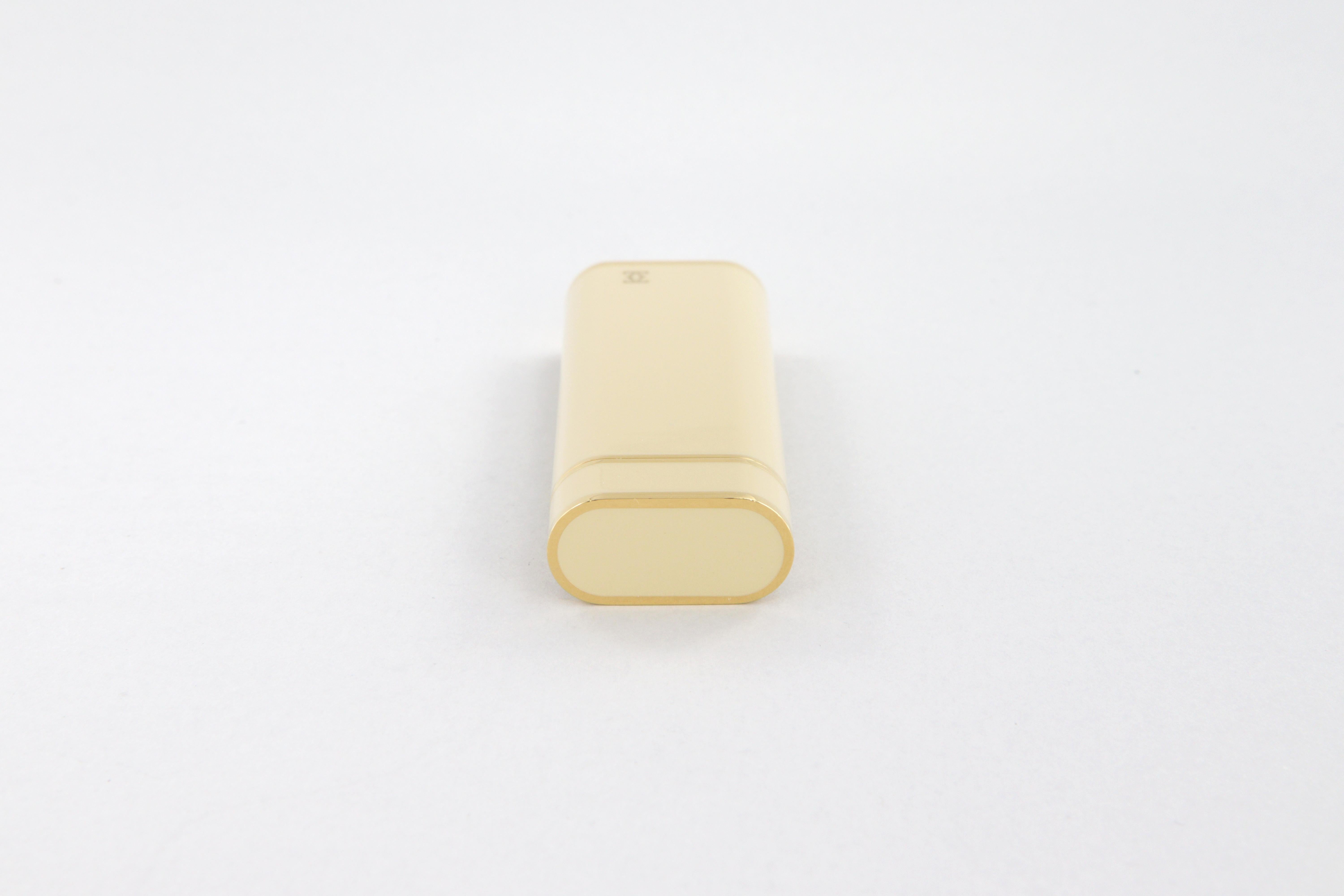 Les Must de Cartier oval gold-plated and ivory lacquer lighter 2