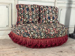 Accent chair, trimmings, and small stitches by Jacques Garcia