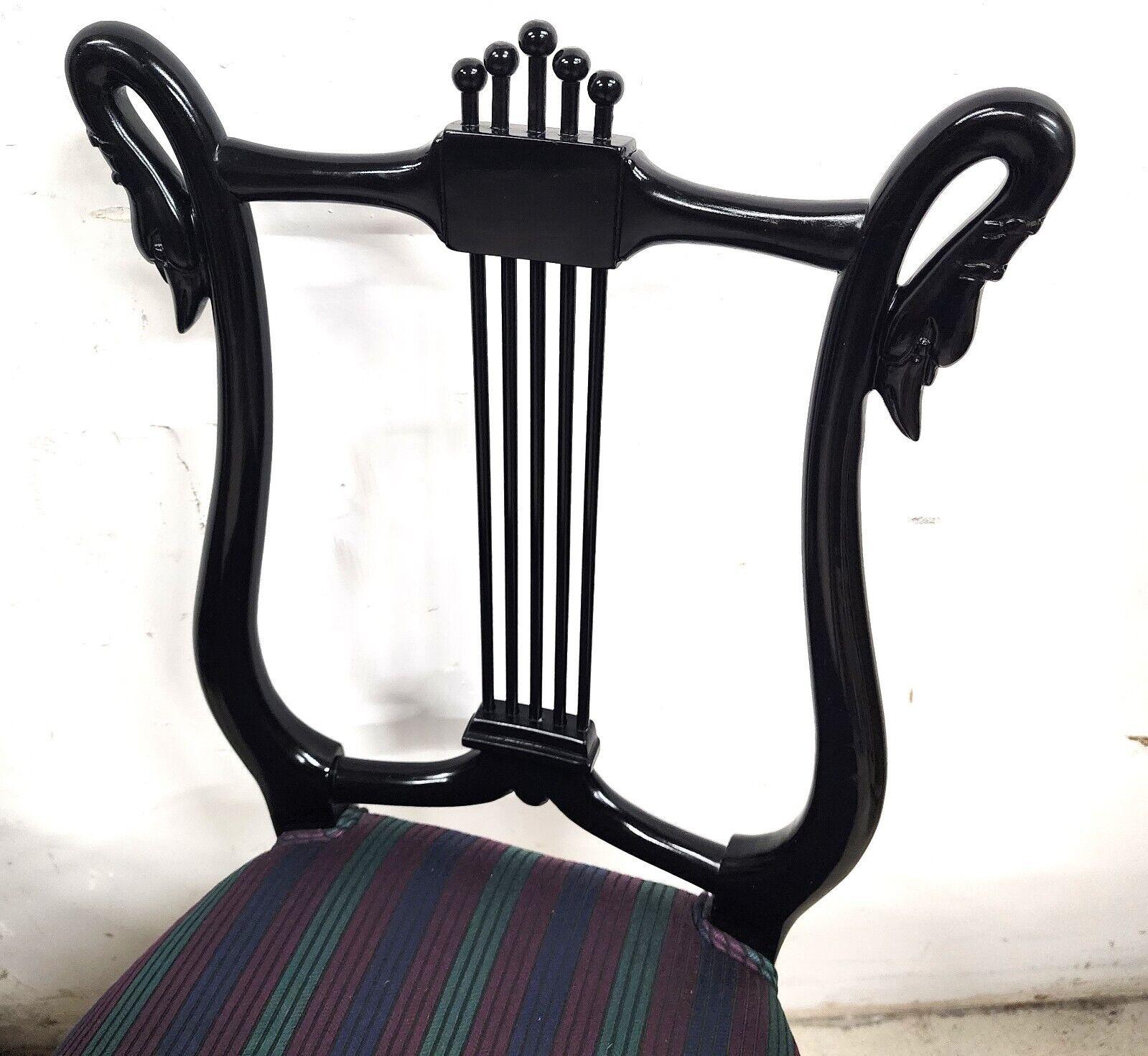 For FULL item description click on CONTINUE READING at the bottom of this page.

Offering One Of Our Recent Palm Beach Estate Fine Furniture Acquisitions Of A
Pair of Swan and Lyre Back Black Lacquered Accent Dining Chairs 

Approximate Measurements