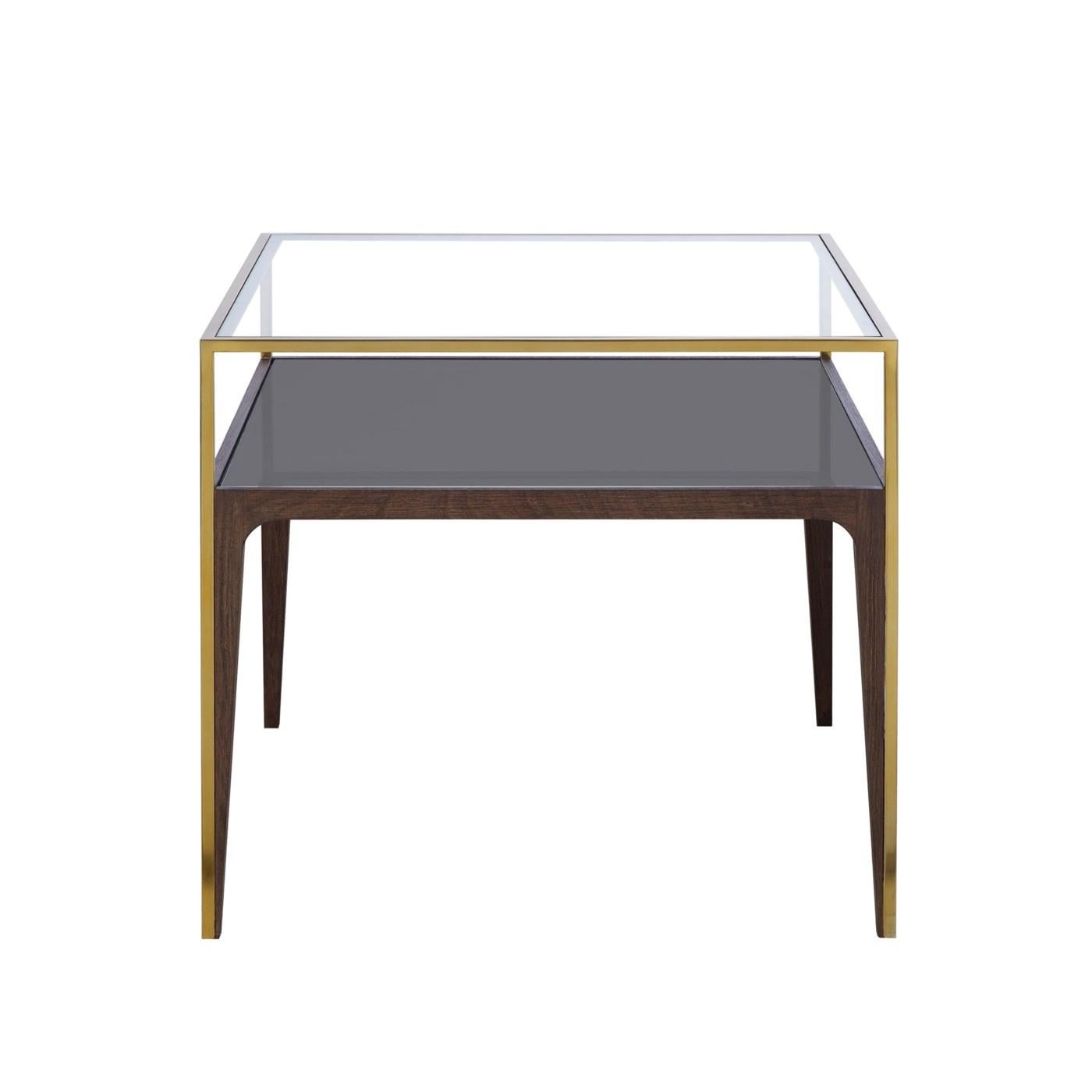 Side table accent with structure in solid beechwood
and walnut tinted. With smoked tempered glass shelve top
and with clear glass top. With stainless steel rim in vintage
brass finish on feet and around the clear glass top.