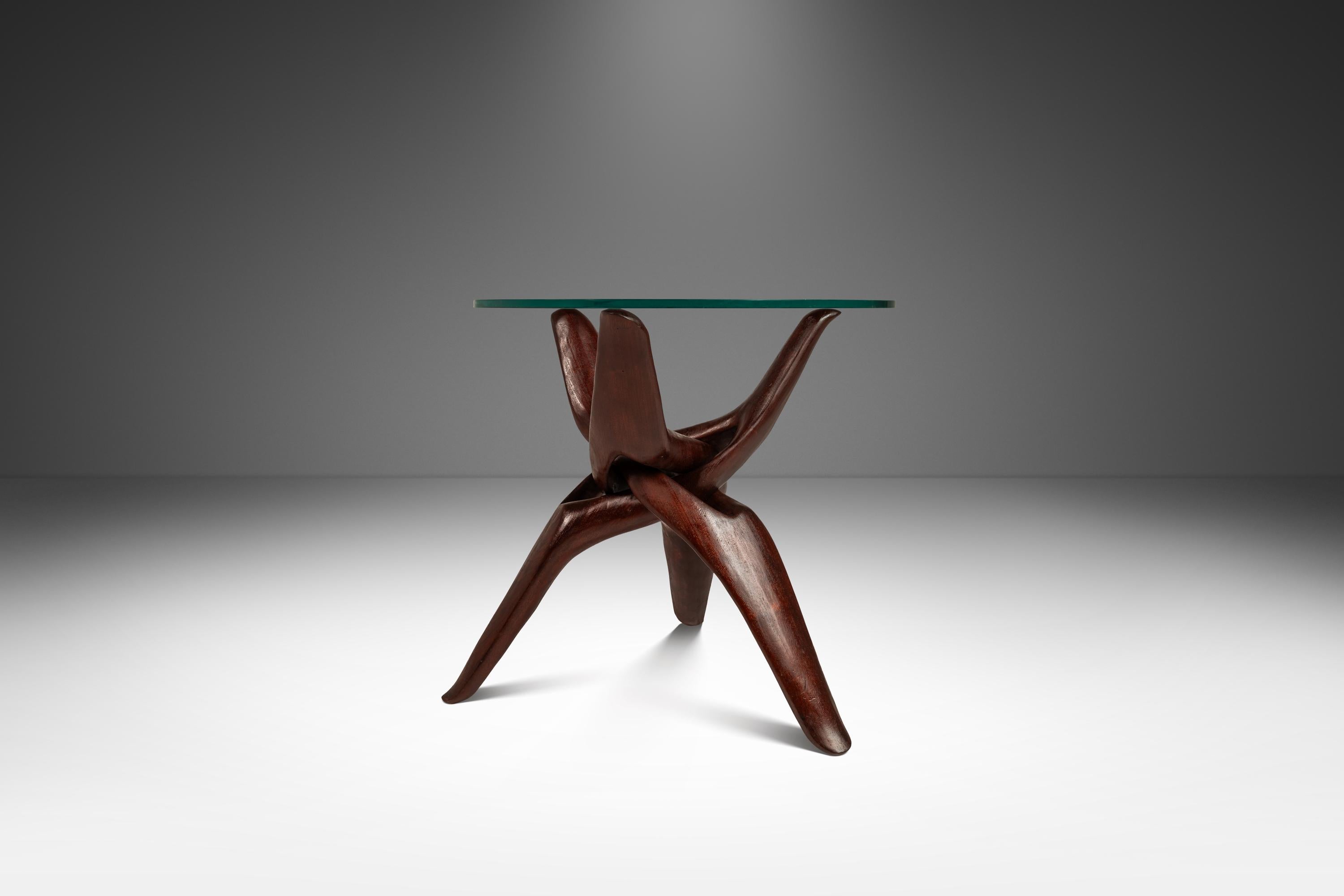 Late 20th Century Accent Table Carved from Mahogany w/ Interlocking Legs & Glass Top, USA, 1970's