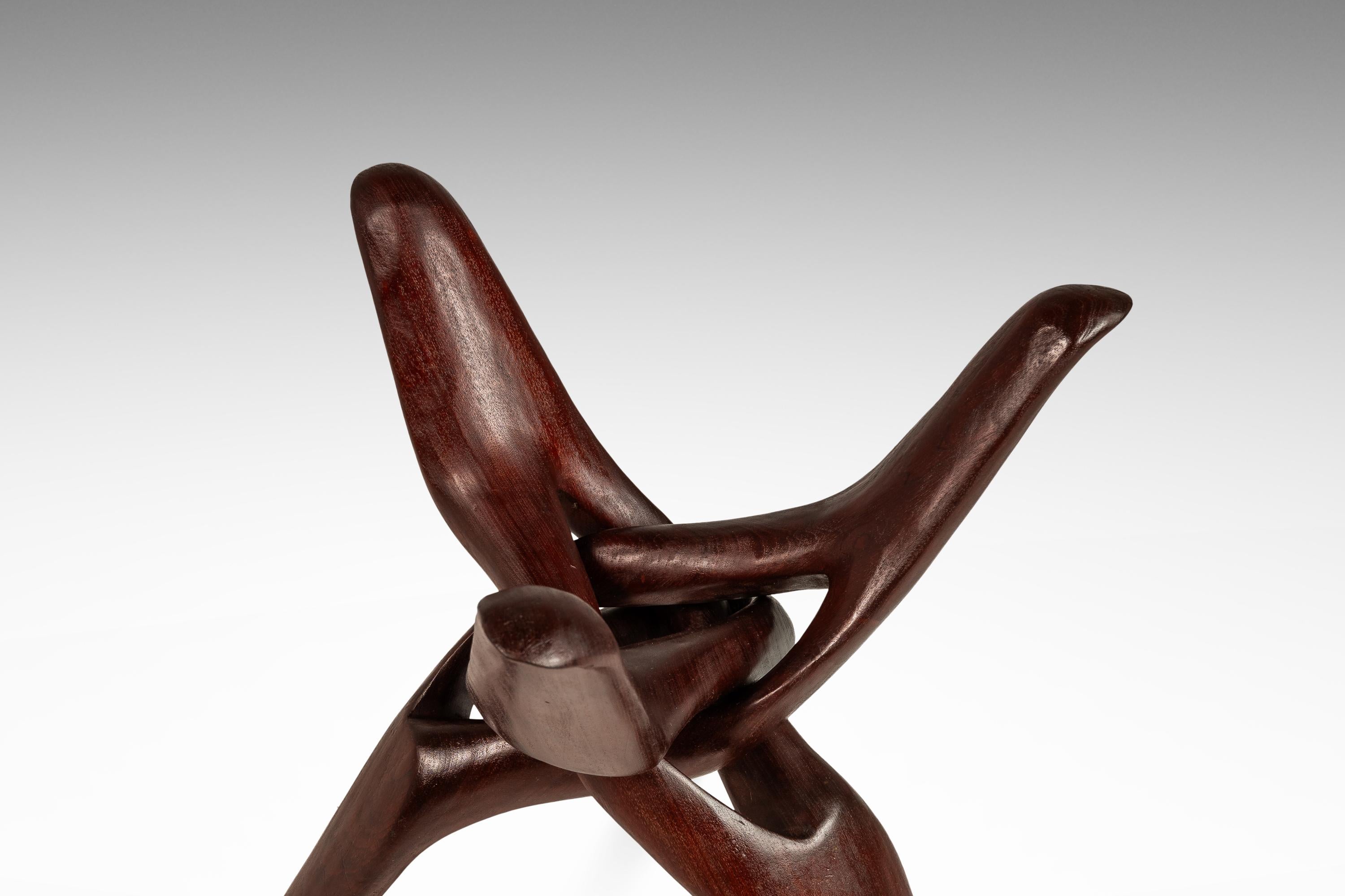 Accent Table Carved from Mahogany w/ Interlocking Legs & Glass Top, USA, 1970's 3