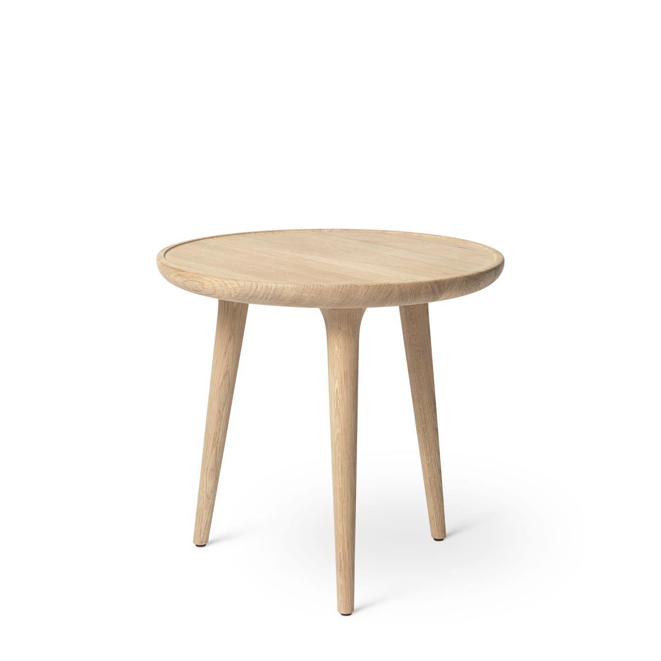 The Mater accent table is designed by the Danish architect duo Space Copenhagen and combines a sculptural and handcrafted aesthetic. Following along the same bloodline as the highly successful 2009 Mater High Stool, the Accent collection consists of
