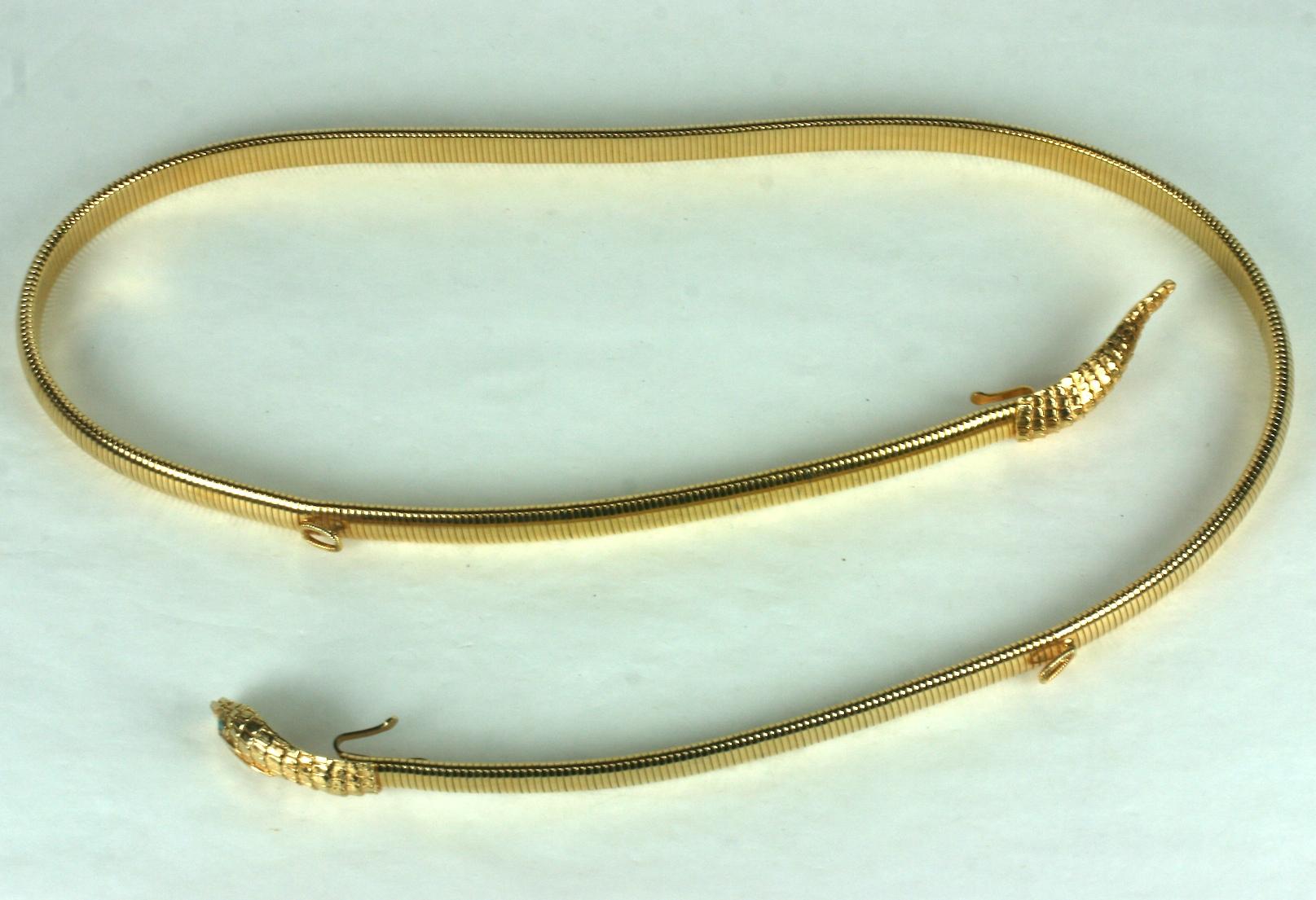 Timeless Gilt Stretch Snake Belt by Accessocraft NY from the 1980's. Snake head and tail motifs on an expandable stretch gilt band which is .5