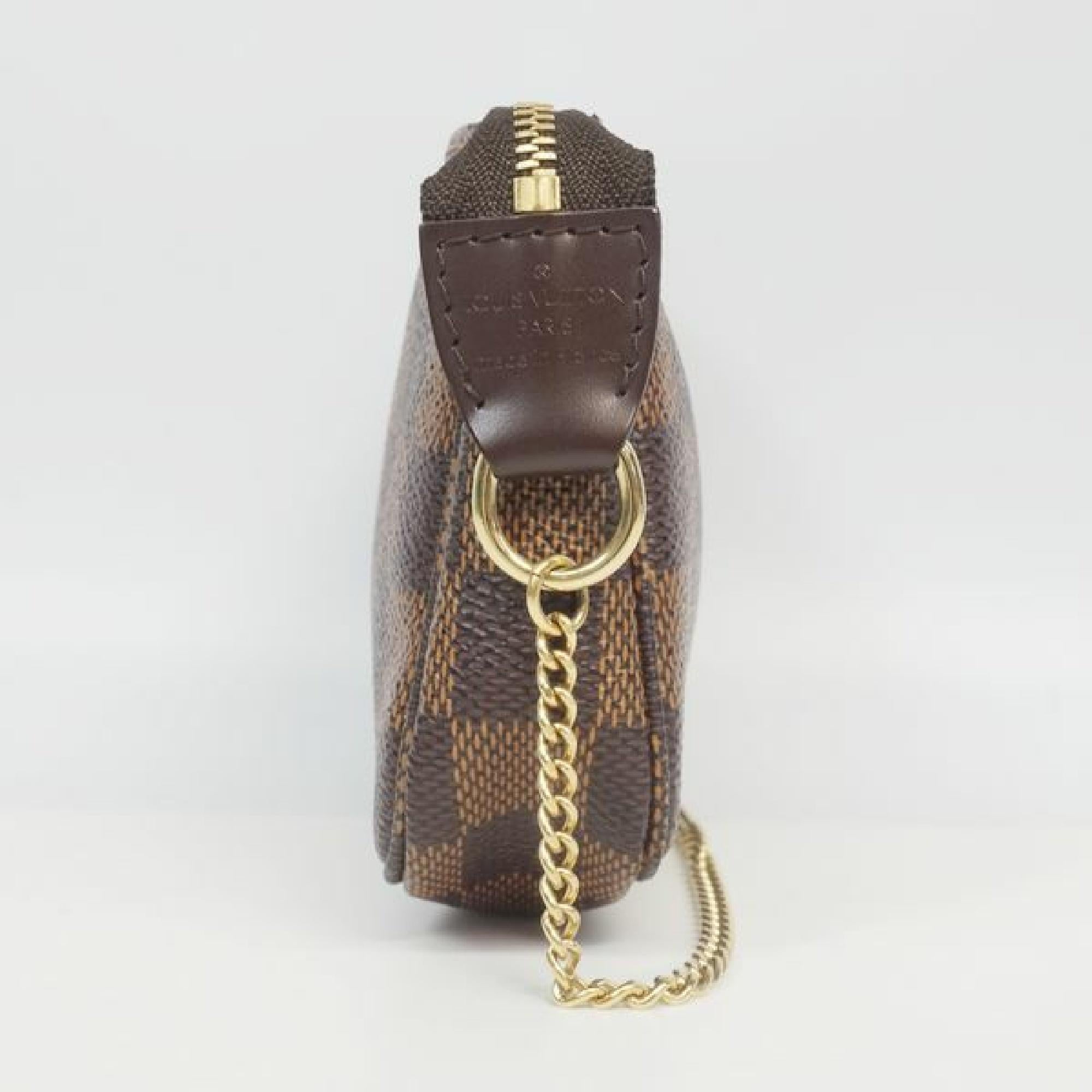 Louis Vuitton Damier Ebene Mini Pochette Accessoires Hand Pouch