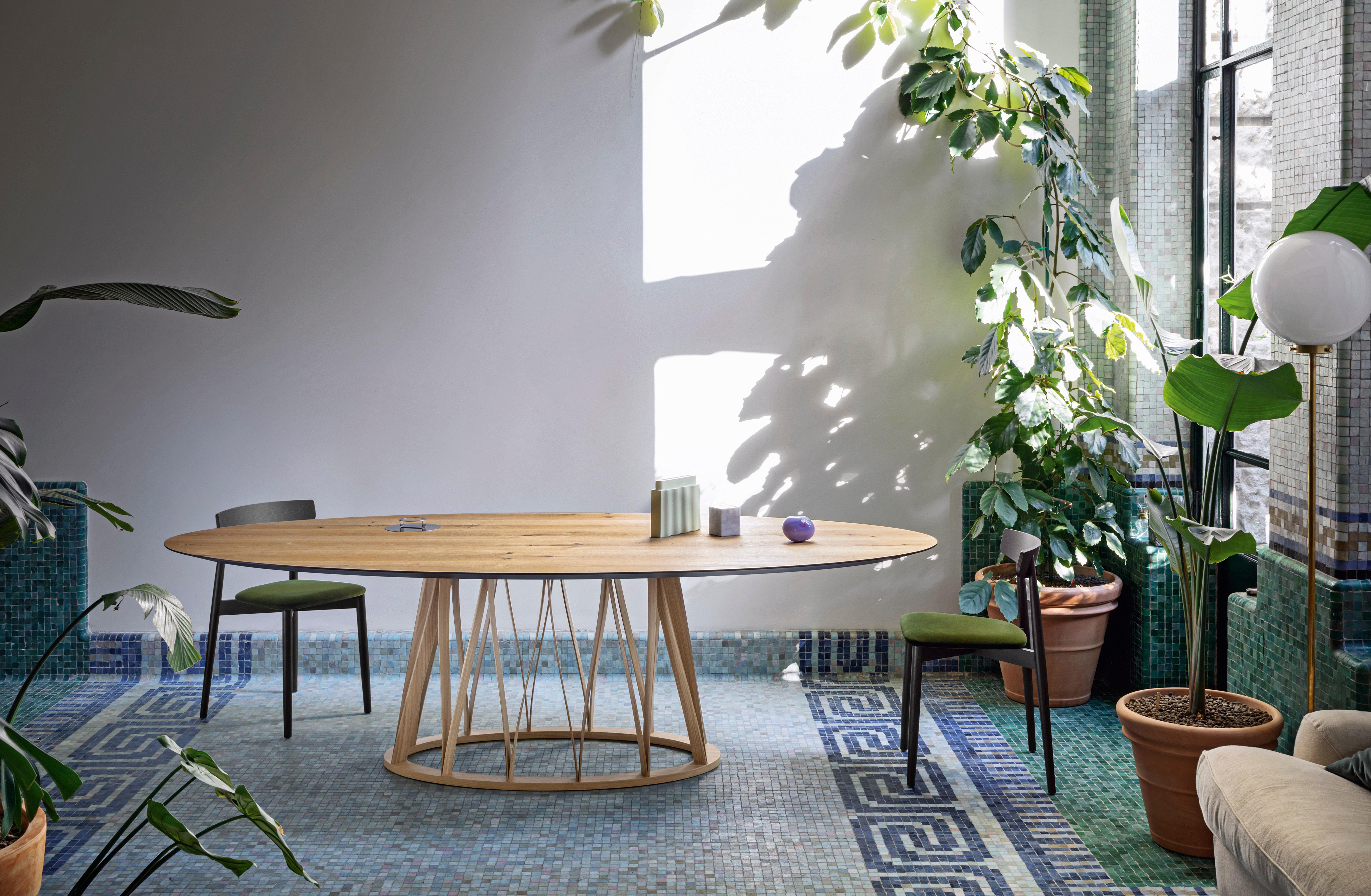 Acco is an elegant dining table with a strong character that resists labelling. It displays a mature, sophisticated language, which is developed through the design of the base frame with its distinct regular pattern of wooden lines.

Additional