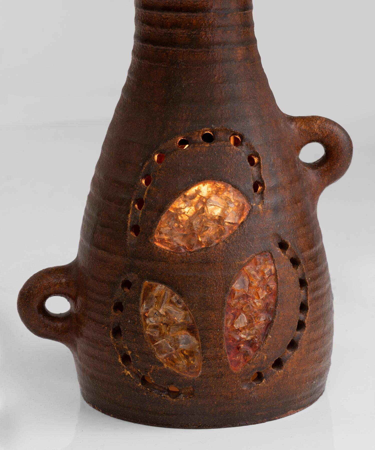 Hand thrown terracotta and illuminating resin base, with colorful resin shade.
  