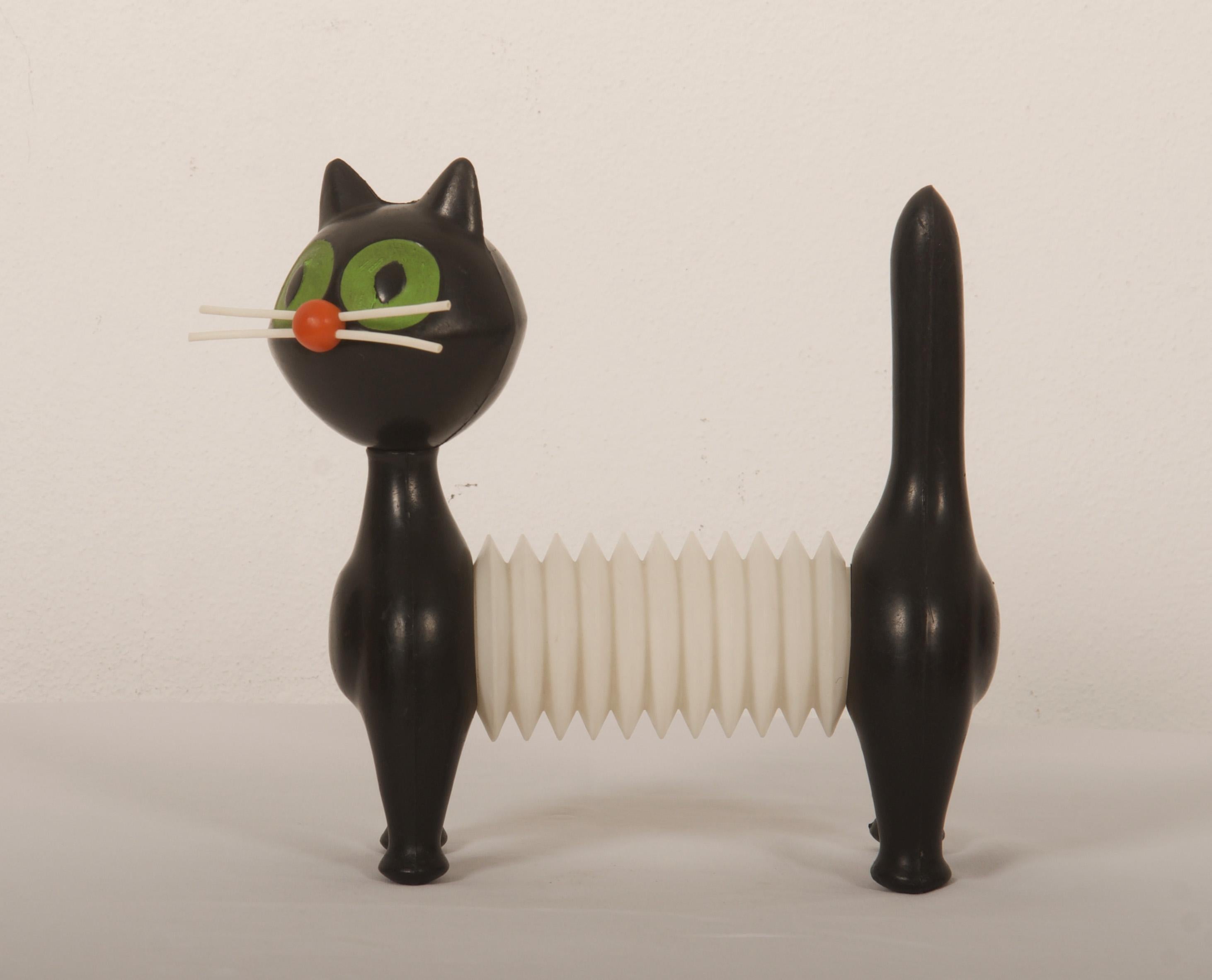 Libuse Niklova for Fatra Napajedla, Czechoslovakia, four-legged construction in the shape of an abstract cat made of different colored plastic (black, white, orange and green). Marked with manufacturer's mark. 
Lit.: Czech 100 Desig Icons, p. 46.