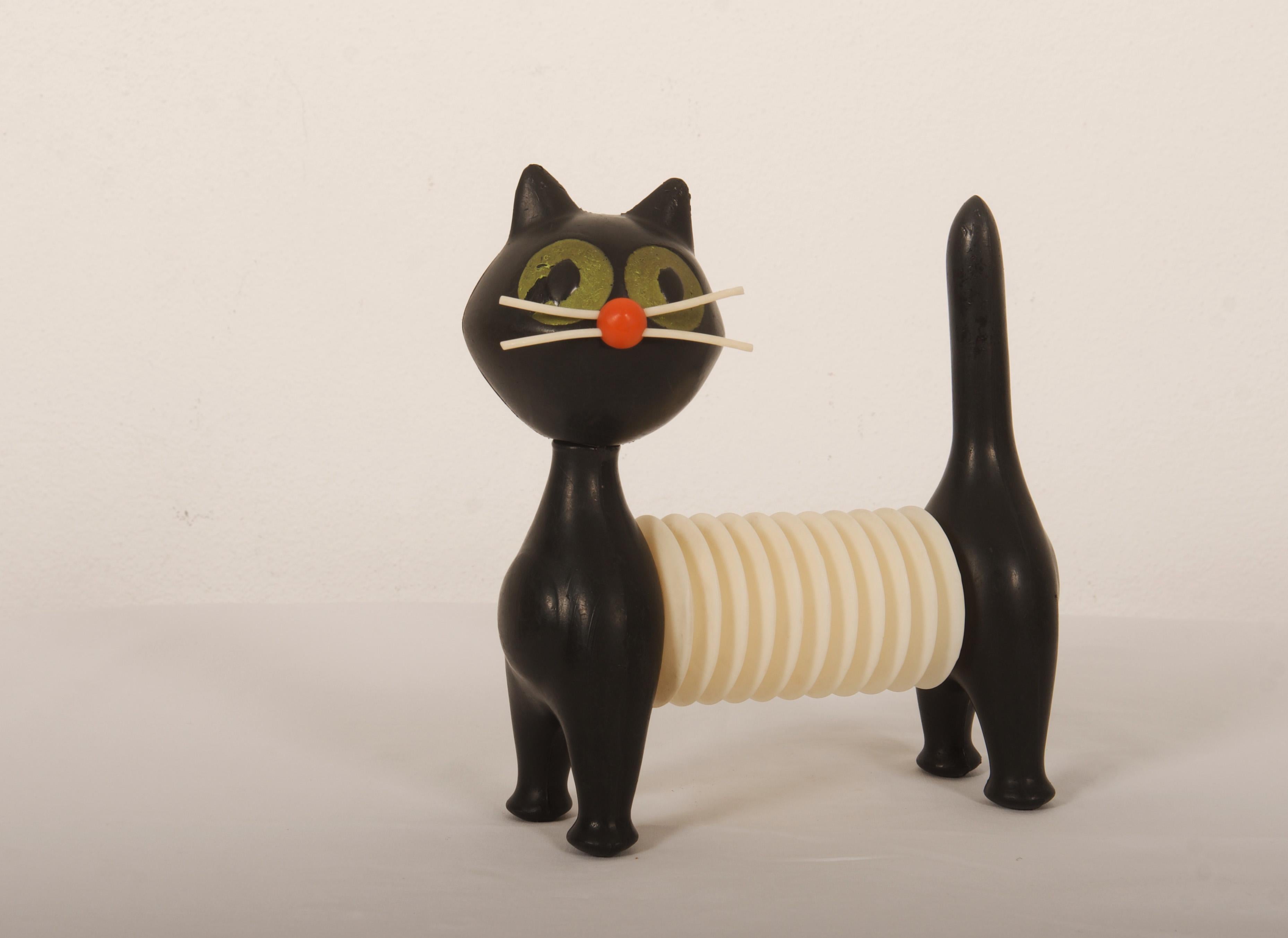 Libuse Niklova for Fatra Napajedla, Czechoslovakia, four-legged construction in the shape of an abstract cat made of different colored plastic (black, white, orange and green). Marked with manufacturer's mark. 
Lit.: Czech 100 Desig Icons, p. 46.