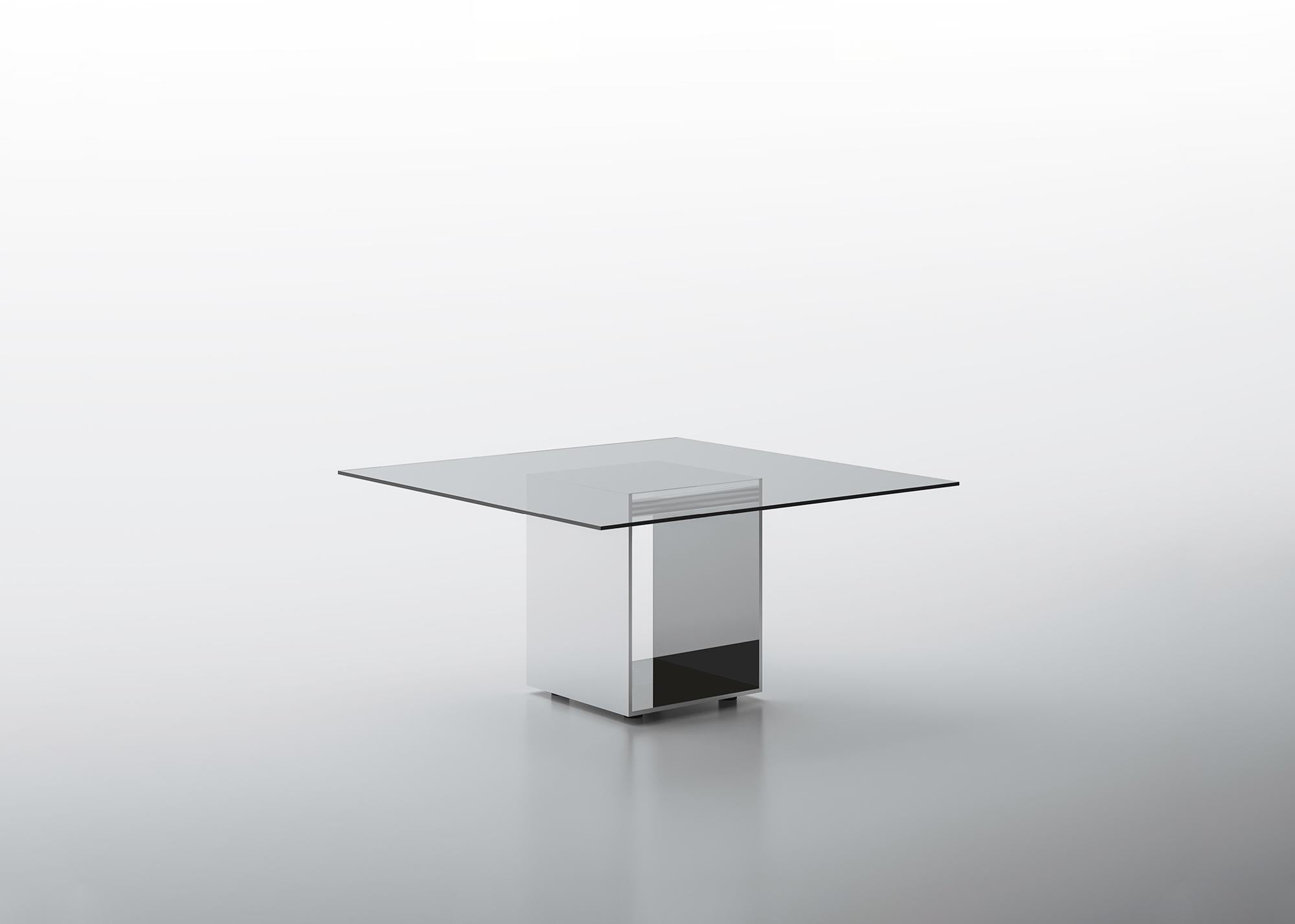 Judd is a system of tables that combines an essential line with rich materials. An innovative structural panel forms the base of the table. The exterior is in bright polished stainless steel, the interior is finished with mirror, lead mirror or