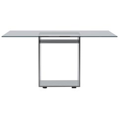 Mesa cuadrada pequeña Acerbis Judd con tapa de cristal transparente y base de acero brillante