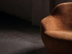 Poltrona Acerbis Pallas con Pouf di Philippe Malouin