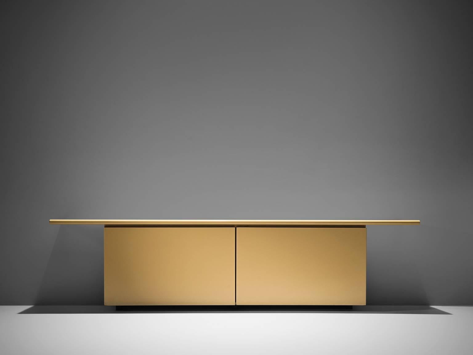 Giotto Stoppino for Acerbis, 'Sheraton' sideboard, cream white to yellow wood, veneer, Italy, 1977.

This sturdy credenza features a unique technique for the doors, combining sliding and hinged movements. The piece is designed by means of the