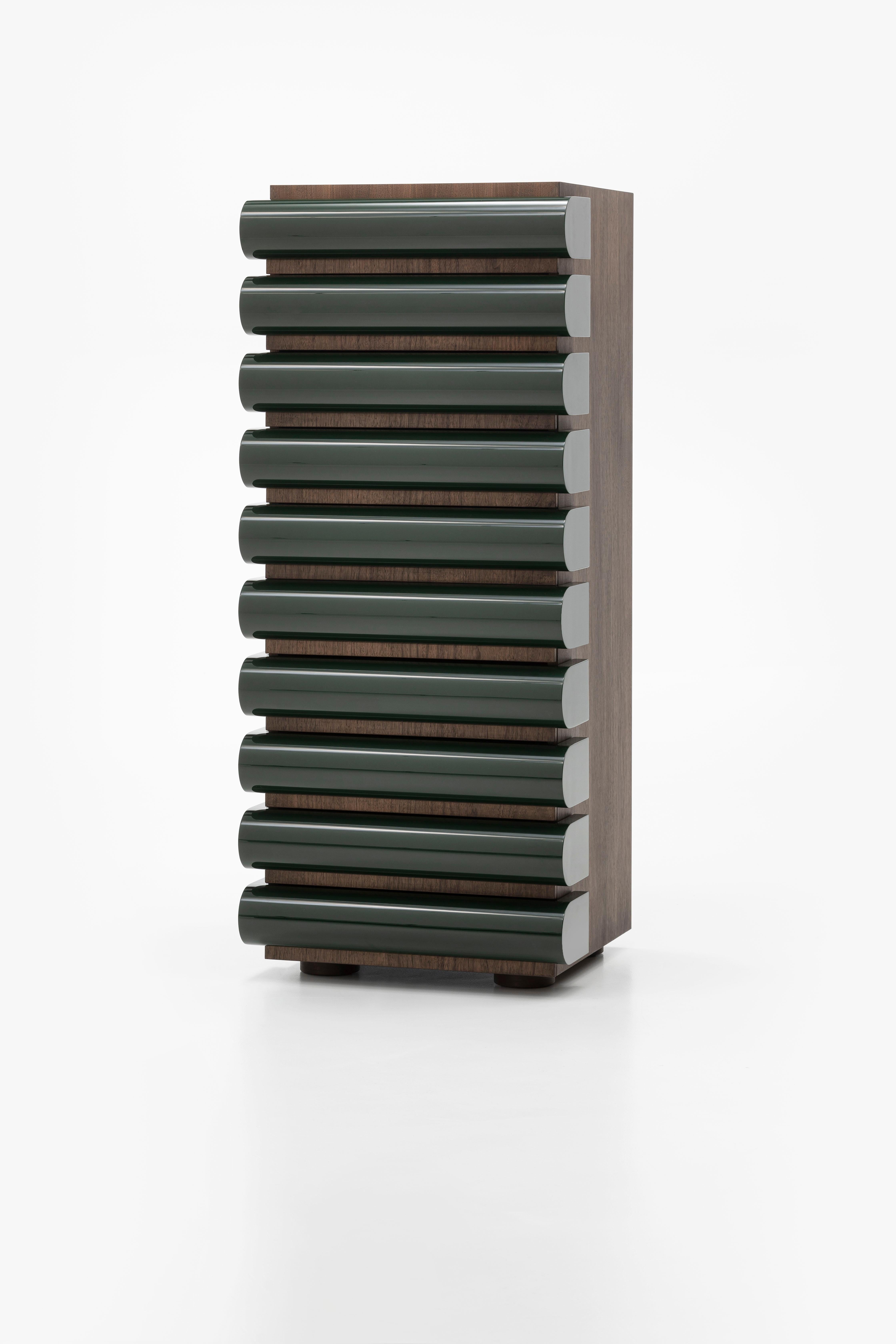 The collection is enriched with a version with four drawers and more contemporary finishes.

In 1994 Nanda Vigo designed a ten-drawer cabinet for Acerbis Storet. It became part of the Bed Side collection thanks to its bedroom-style finishes.
The