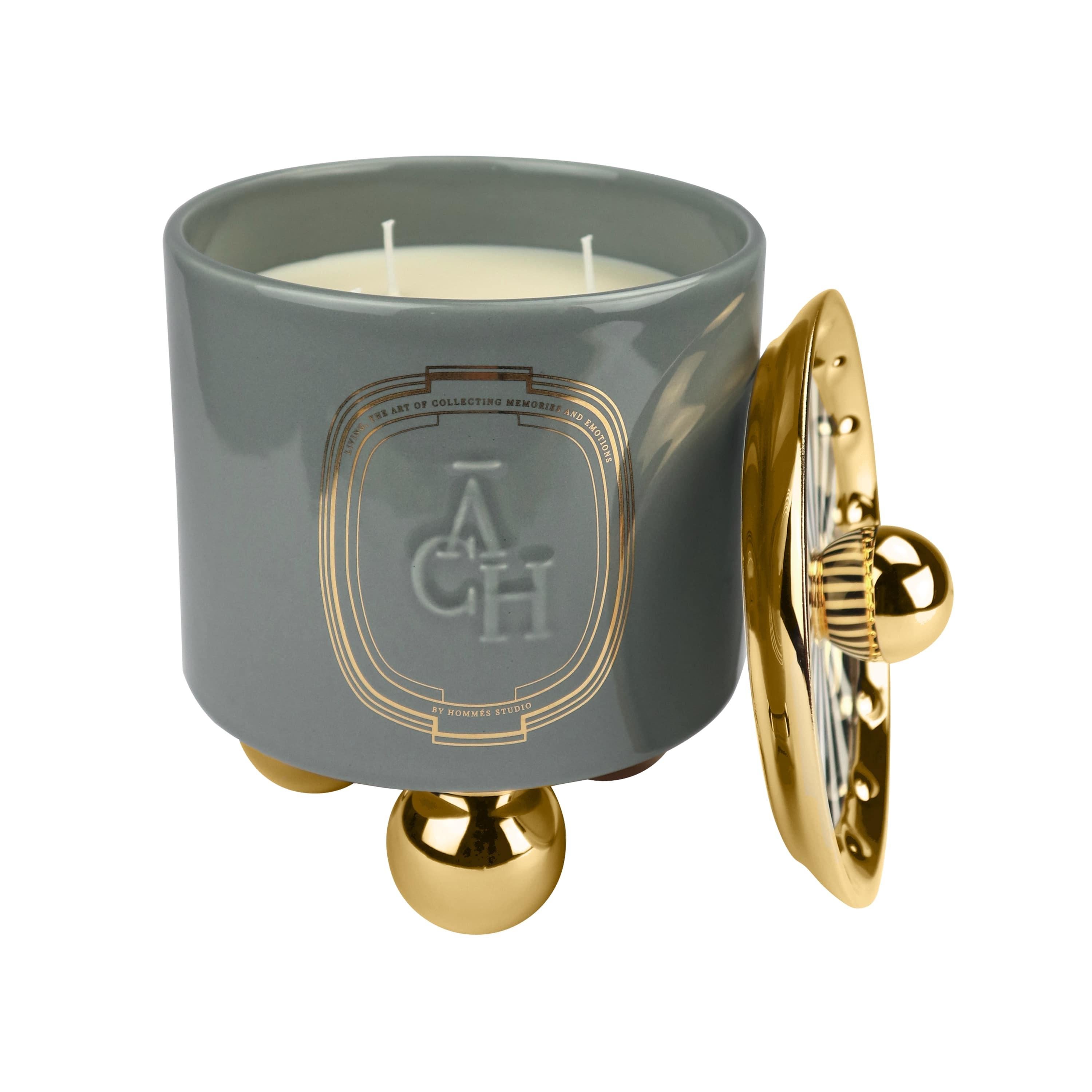 Achi Grey Candle Fragrance, Luxury Modern Ceramic Decor Container Box with Lid
Achi candle releases a hypnotic perfume adding extra value to a space thanks to its eye-catching container design. The natural composition of scents promises to excite