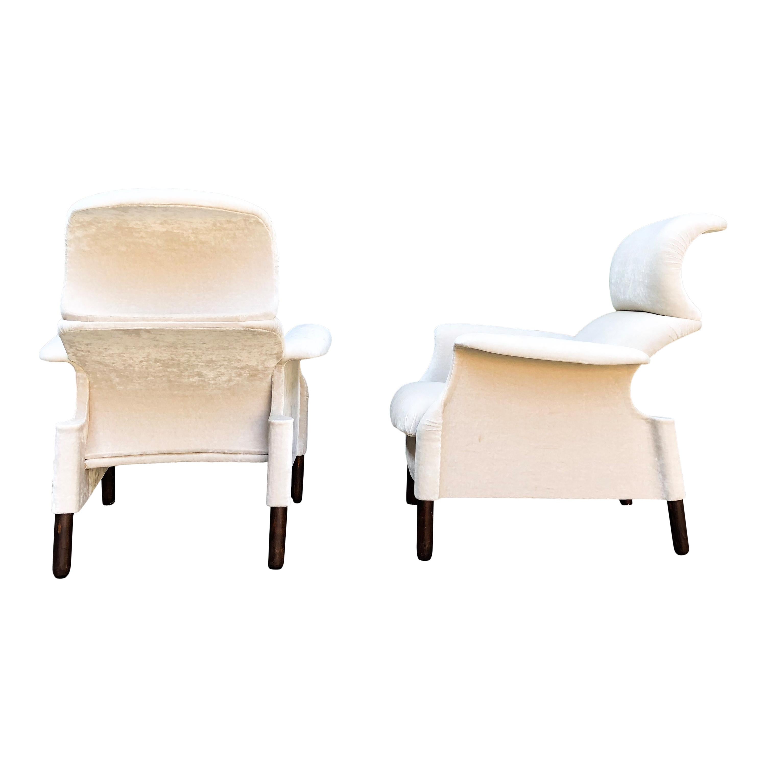 Pair of Sanluca armchairs dating back to the first Gavina SpA production, with the original beige velvet upholstery. Each armchair is made of separate wooden curved pieces connected by screws. Sanluca is the first result of deep collaboration and