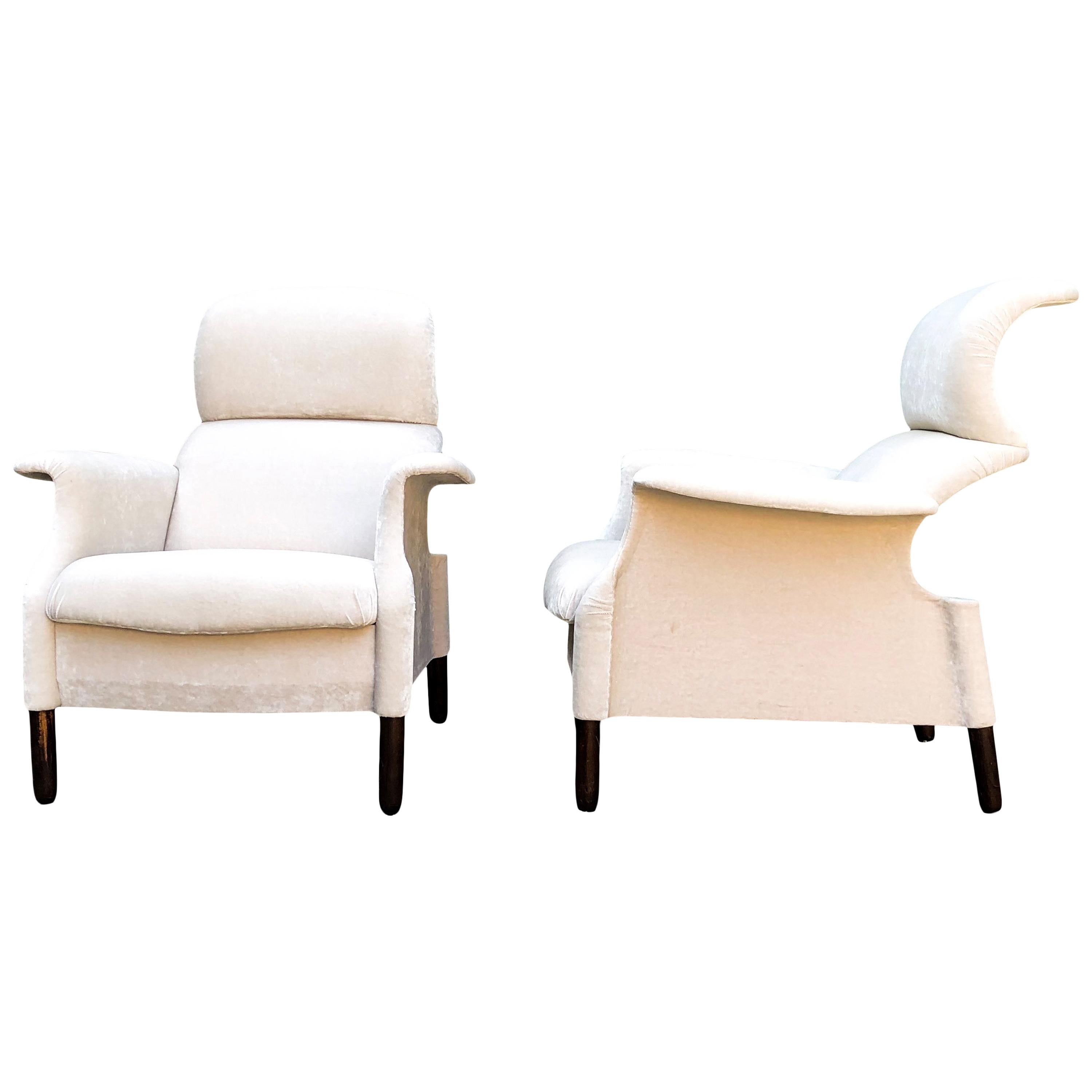 Pair of Sanluca armchairs dating back to the first Gavina SpA production, with the original beige velvet upholstery. Each armchair is made of separate wooden curved pieces connected by screws. Sanluca is the first result of deep collaboration and