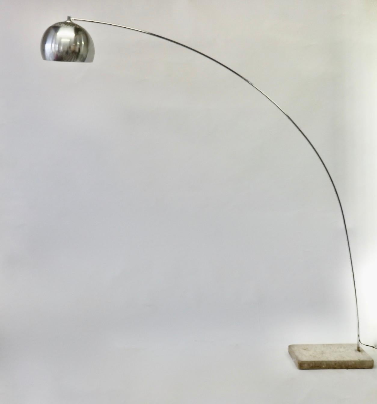 Attributed to Achille and Pierre Castiglioni Arco lamp. Arcing chrome shaft hold aluminum ball globe anchored in steel covered cast cement. Shown here with cement and covered base. Base measures 19 deep - 11.5 wide - 2.5 tall. Lamp is 82 high at