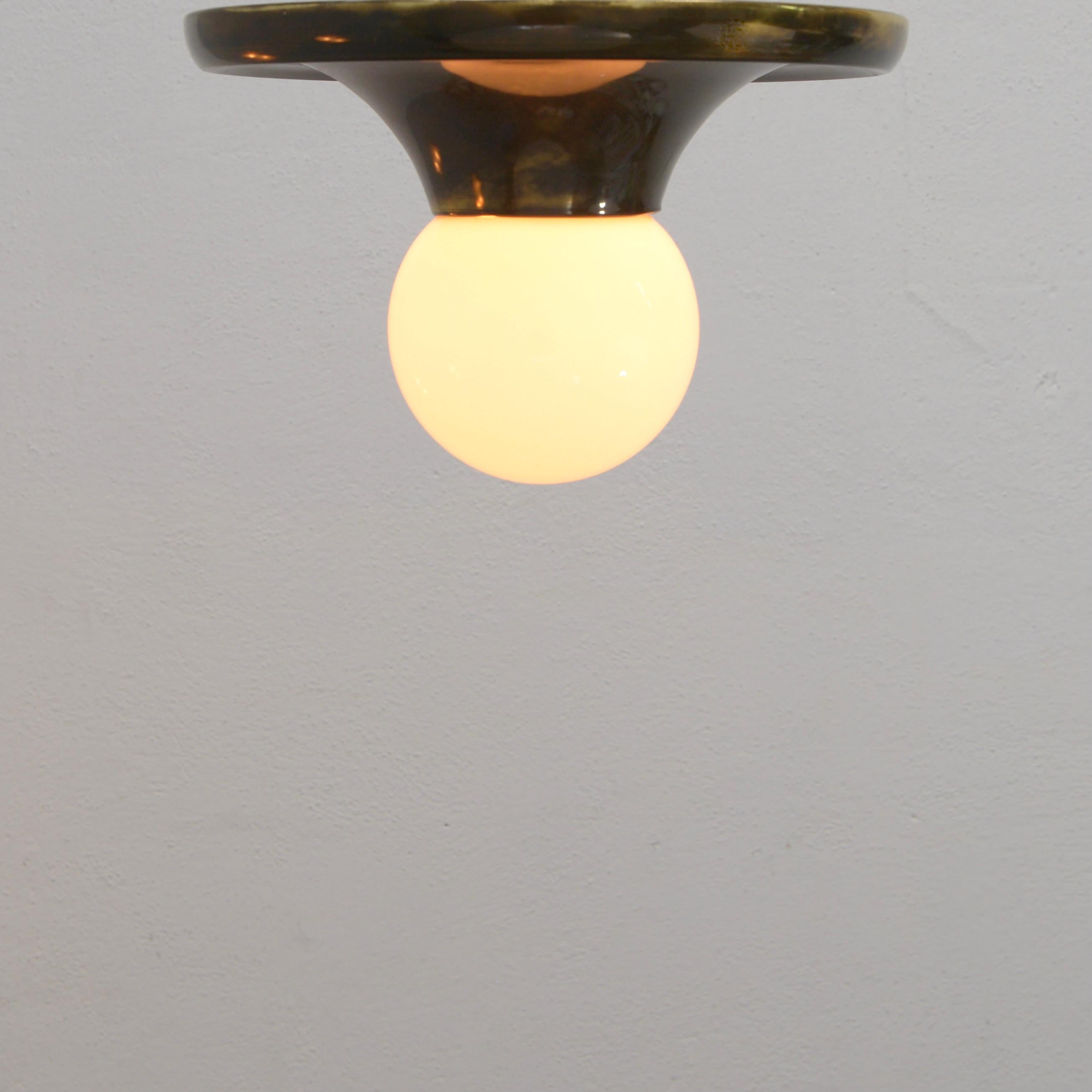Brass Light Ball Lamp by: Achille & Pier Giacomo Castiglioni For Sale