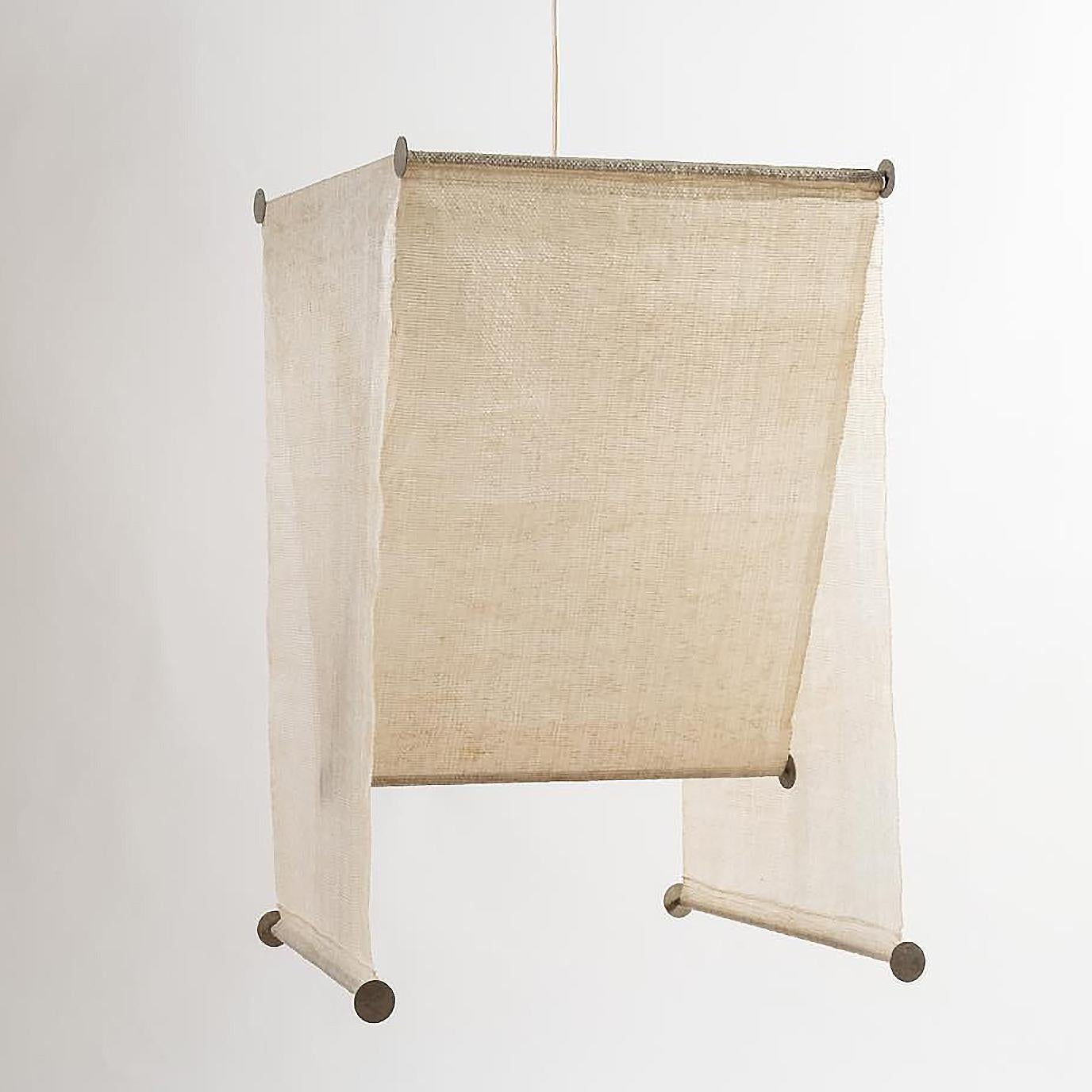 Achille Castiglioni (1918-2002) & Pier Giacomo Castiglioni (1913-1968)

Kd51/R - Teli

A metal and polyethylene fabric rectangular pendant light.
With a Flos label underneath.
Produced by Flos, Italy.
1970s.

Literature
Ottagono n°30, September